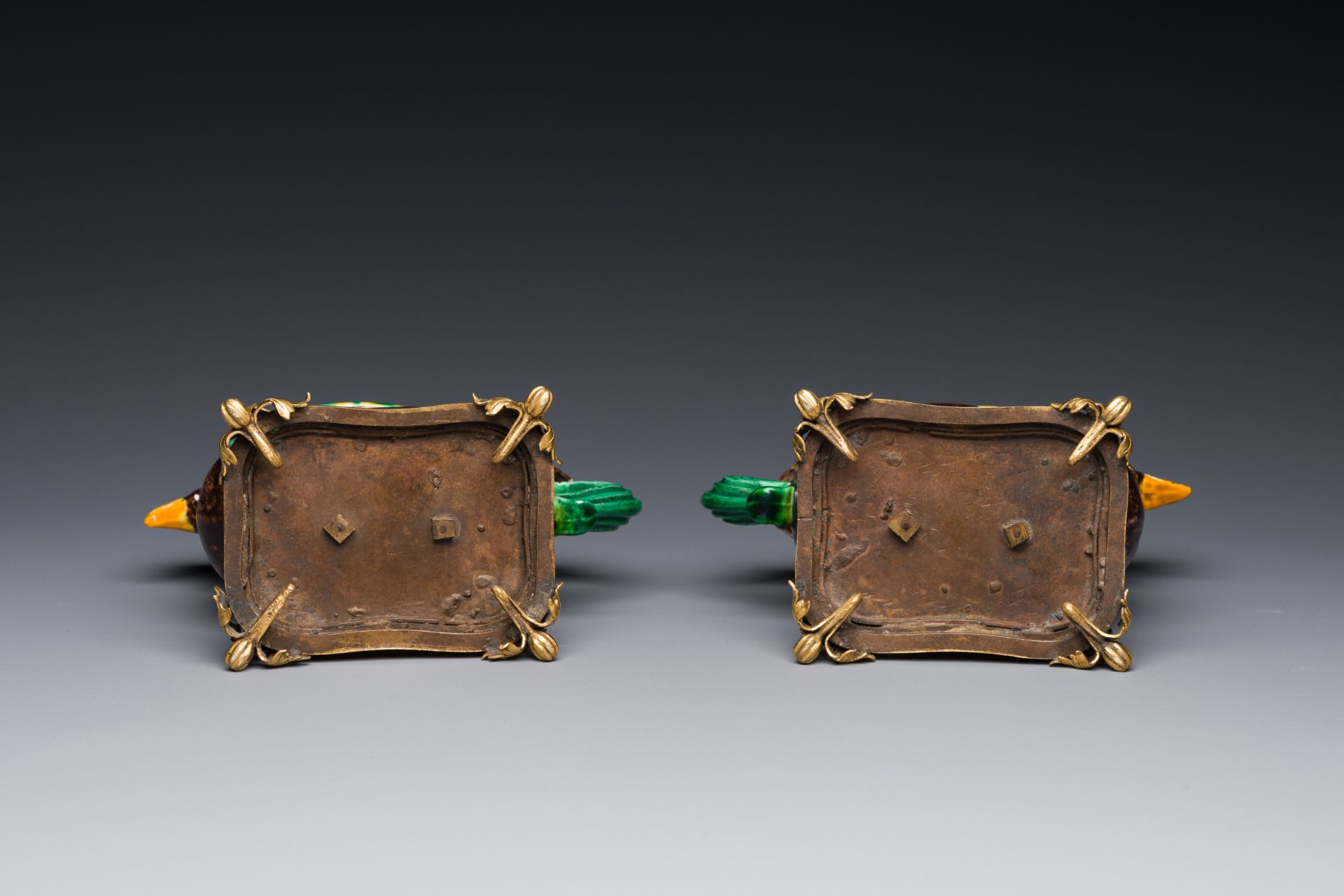 A pair of Chinese sancai-glazed chicken ewers mounted as candleholders with gilt bronze, Kangxi - Image 4 of 4