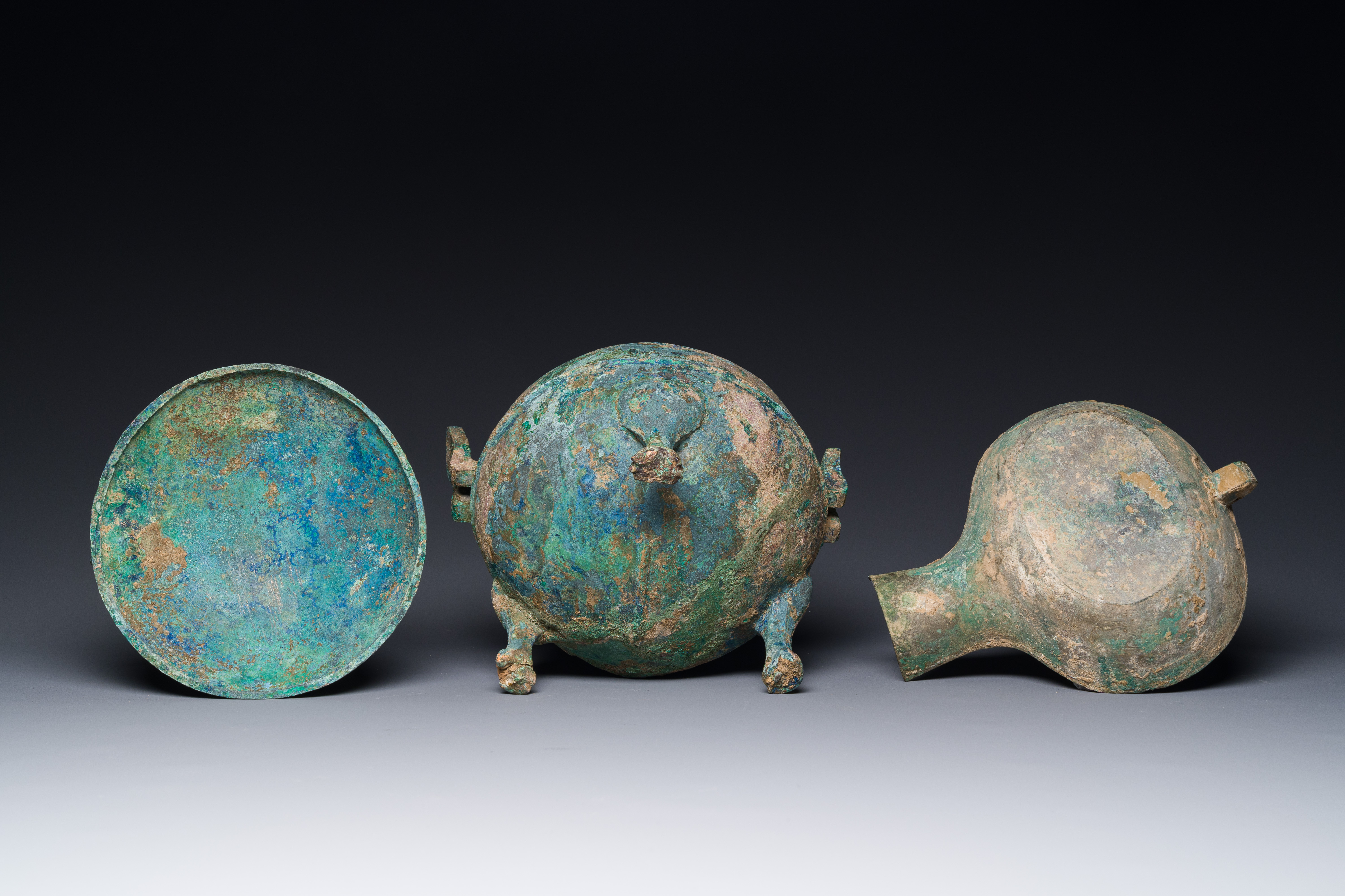 A group of four Chinese archaic bronze wares, late Shang, Warring States and Han - Image 11 of 12