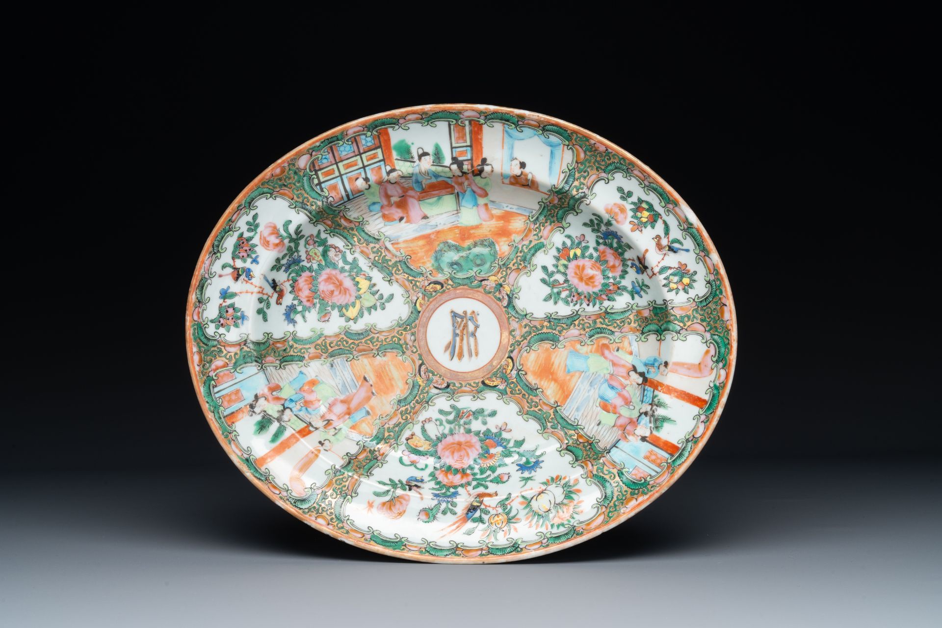 An oval Chinese monogrammed Canton famille rose dish, 19th C.