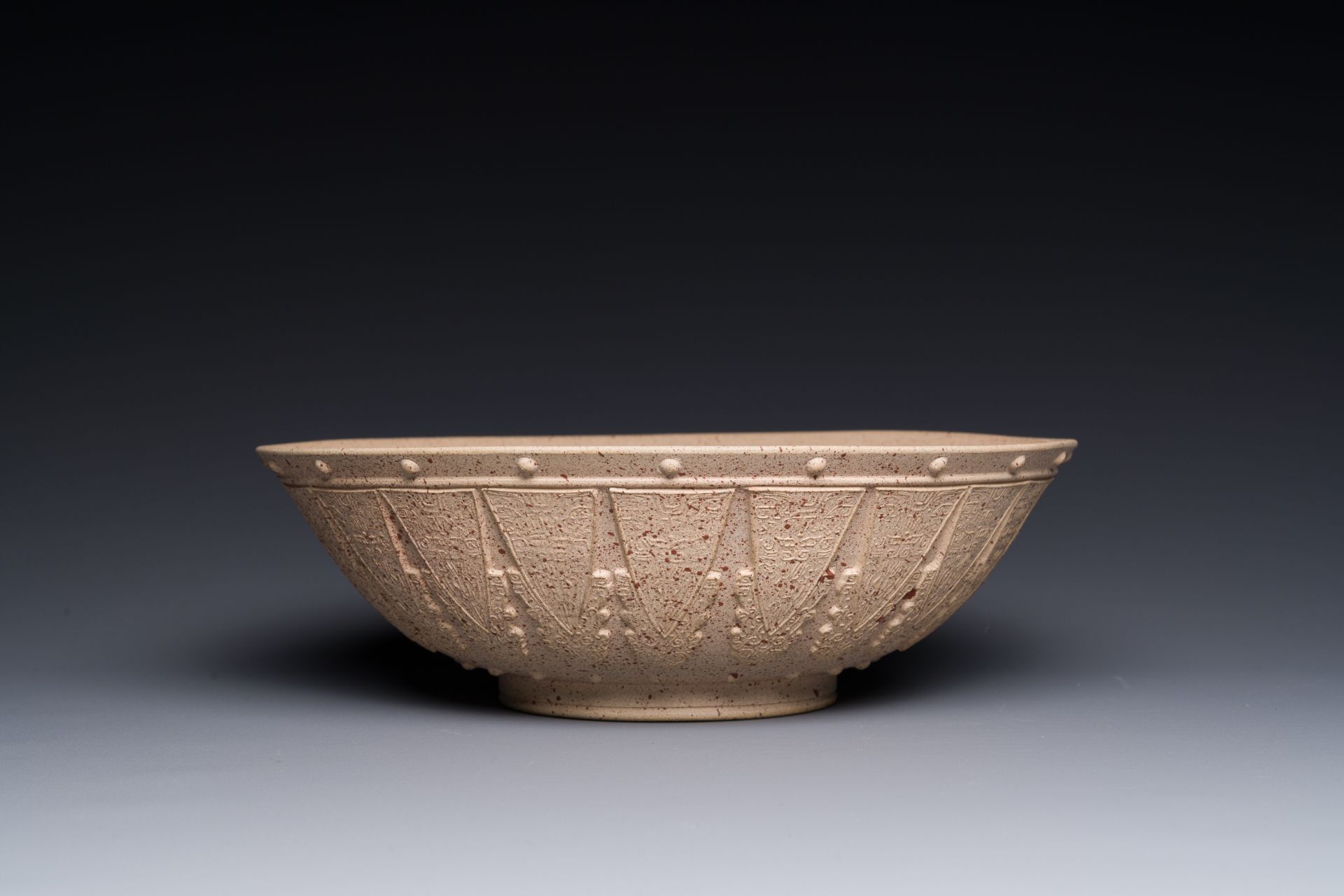 A large Chinese Yixing stoneware bowl with relief design, Qianlong mark, 18/19th C. - Image 3 of 4
