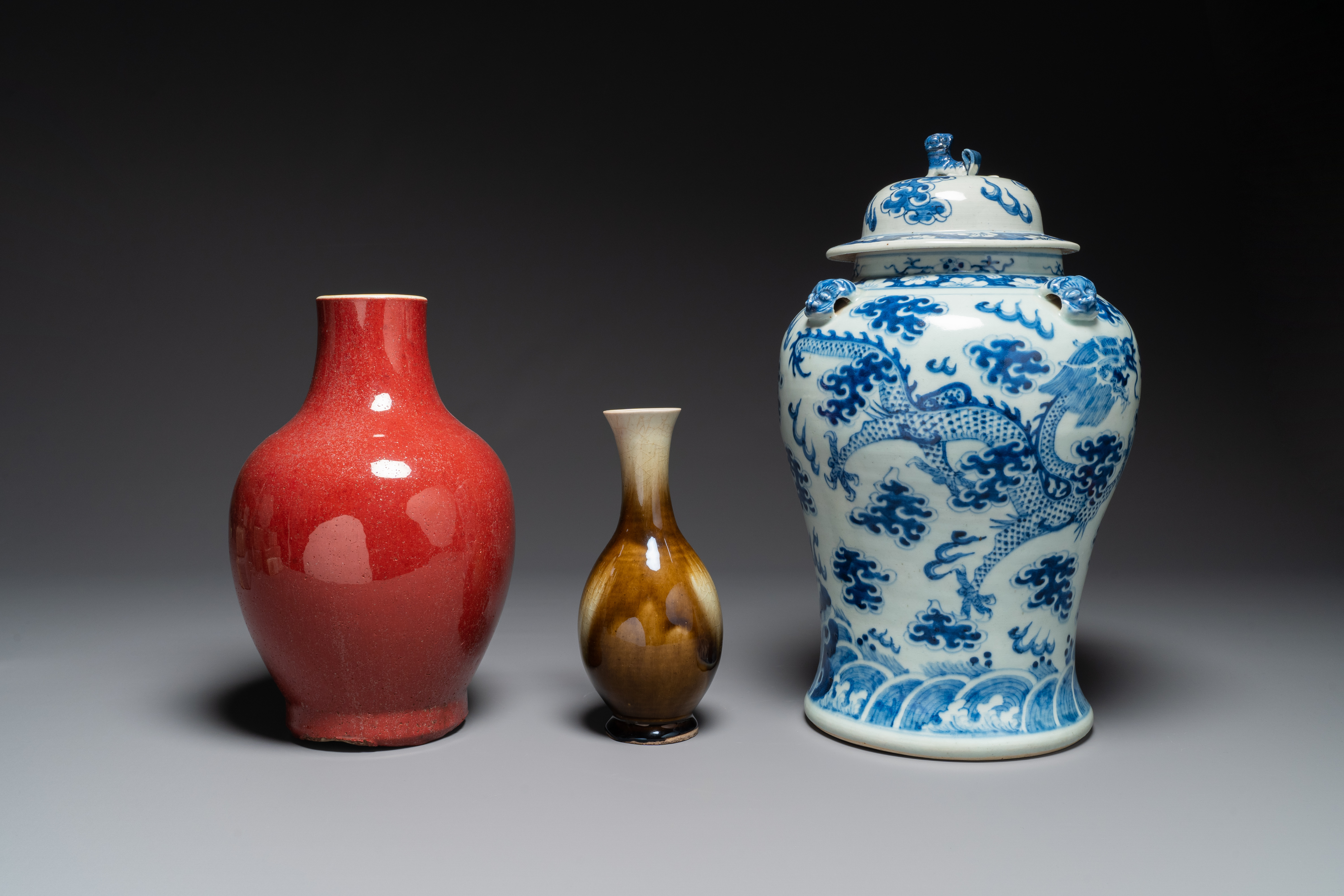 Two Chinese monochrome-glazed vases and a blue and white covered vase, 19th C. - Image 2 of 4