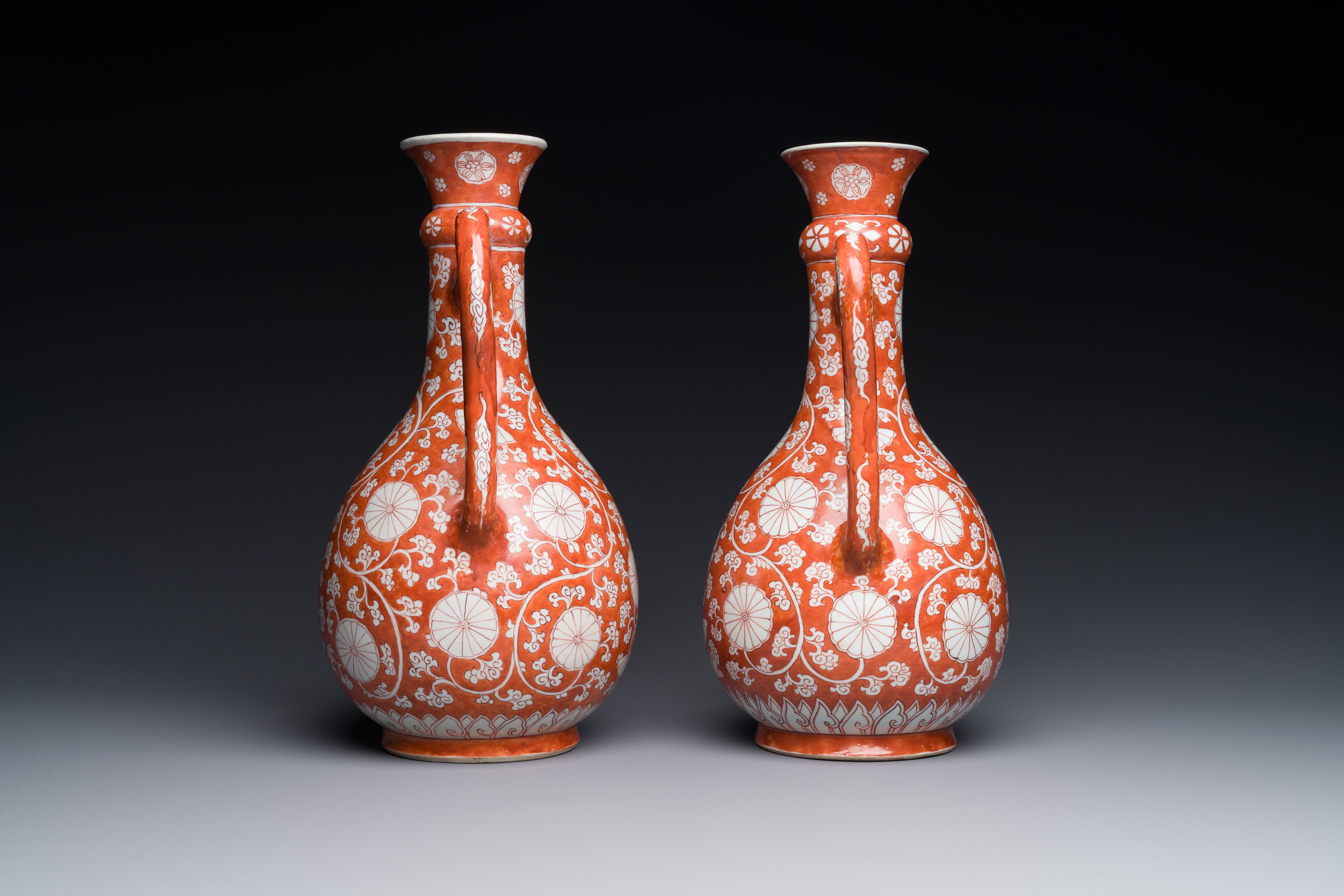 A pair of rare Chinese iron-red-enamelled 'chrysanthemum scroll' ewers, Kangxi - Image 3 of 7