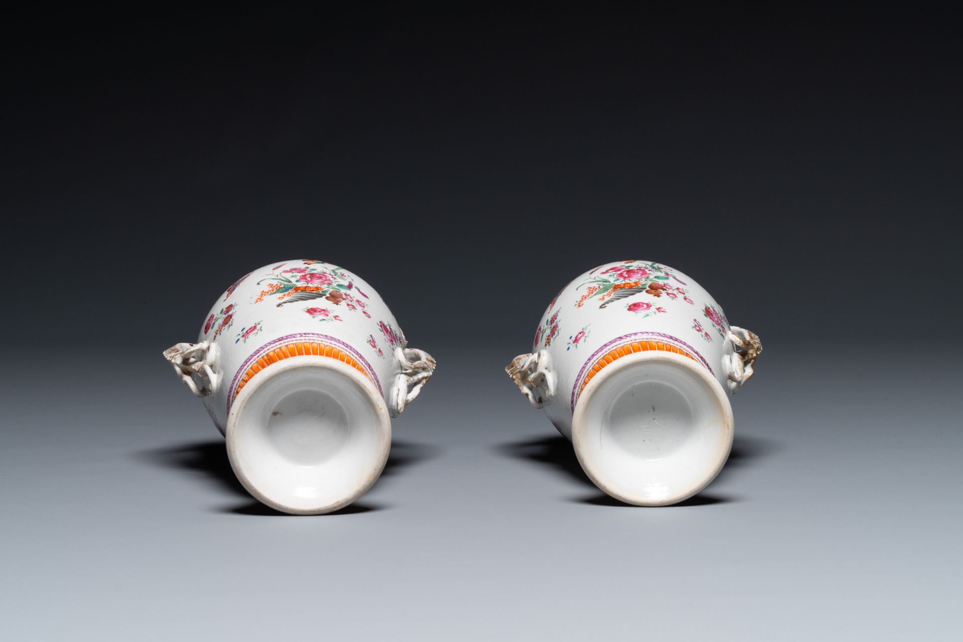 A pair of Chinese famille rose 'cornucopia' vases with chilong handles, Qianlong - Image 6 of 6