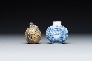 A Chinese blue and white snuff bottle and a famille rose openworked ball, 19th C.