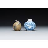 A Chinese blue and white snuff bottle and a famille rose openworked ball, 19th C.