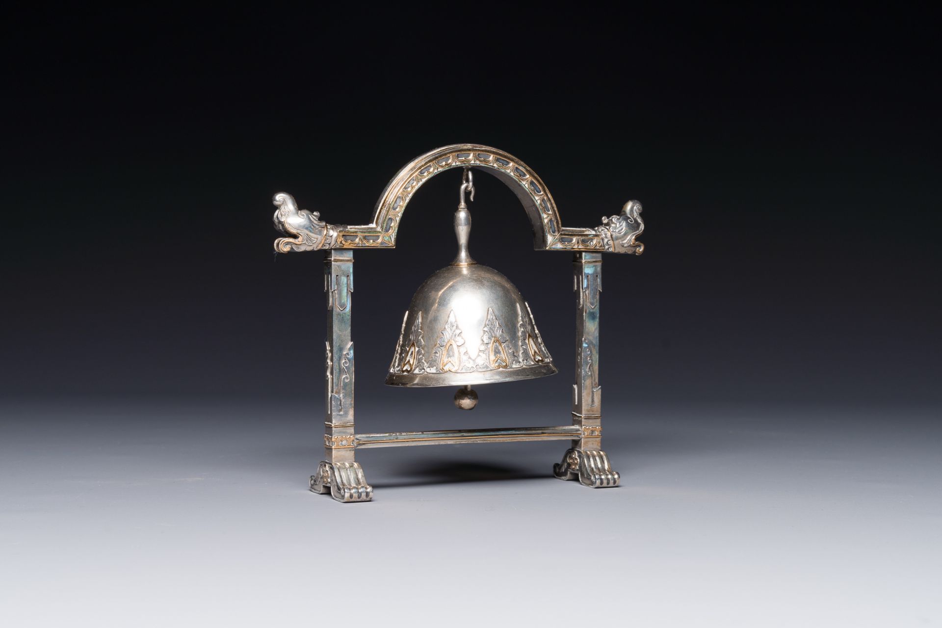 A fine parcel-gilt silver table bell or miniature gong, Southeast Asia, early 20th C.