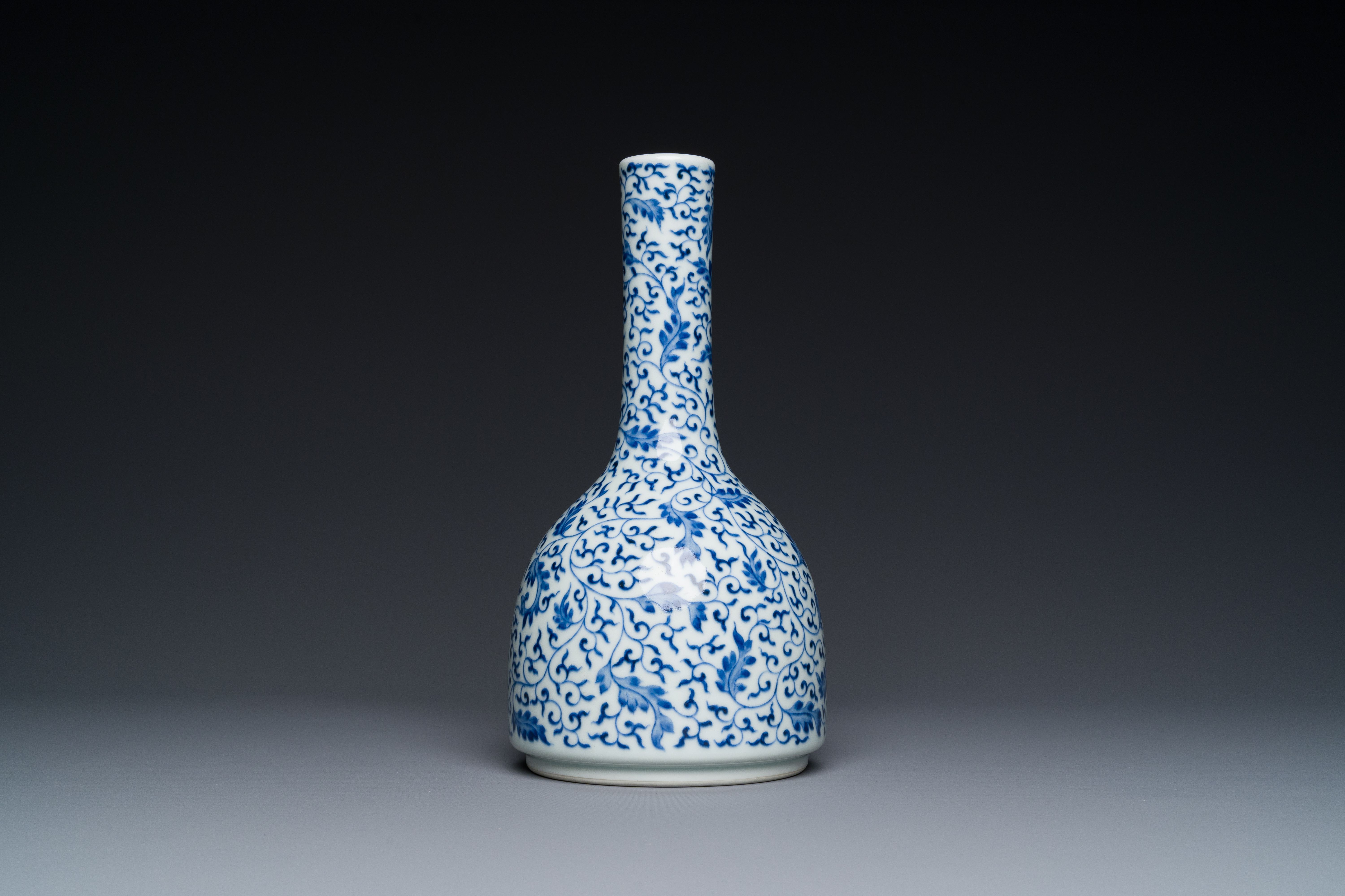 A Chinese blue and white 'lotus scroll' bottle vase, Yongzheng mark and possibly of the period - Image 3 of 6