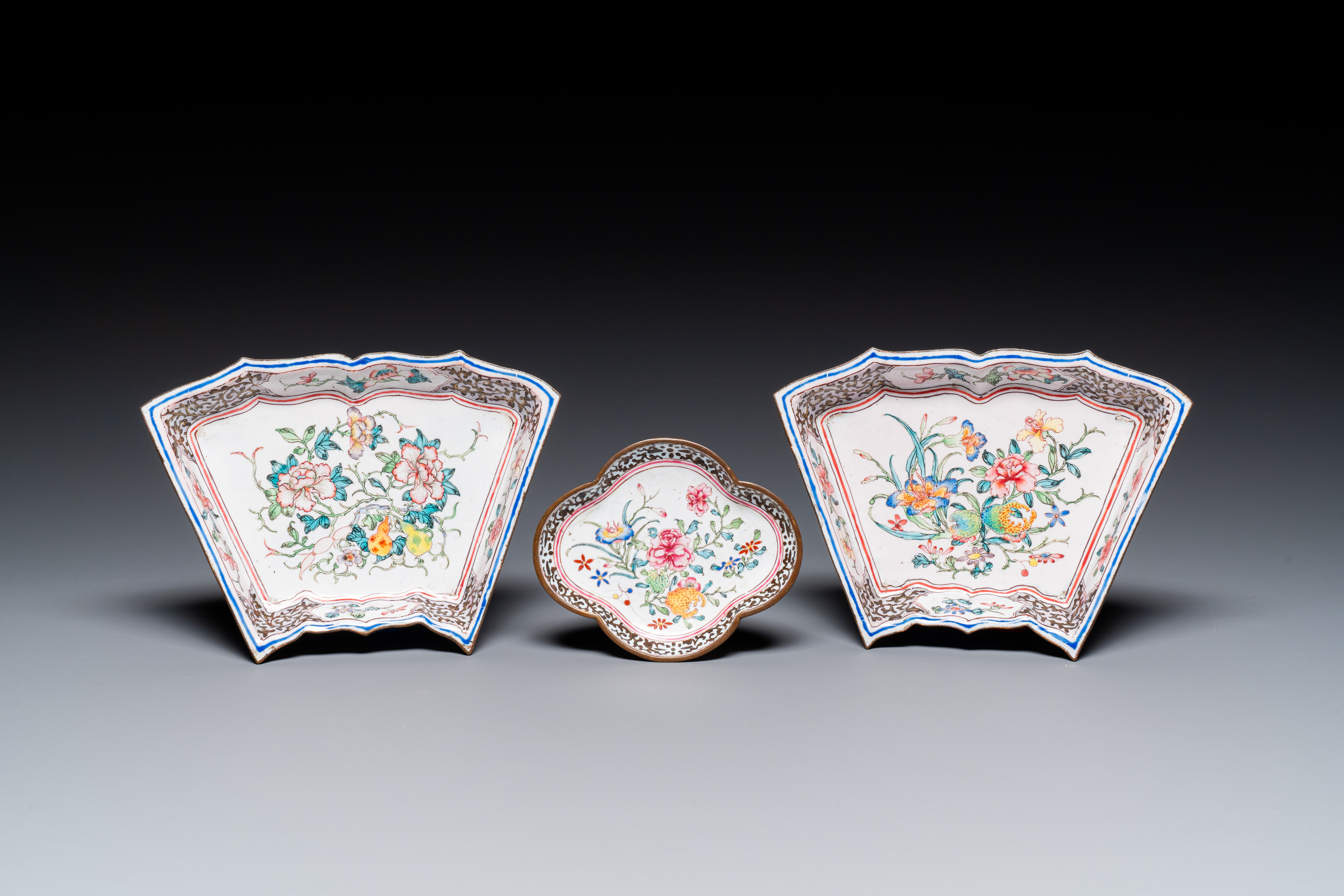 A pair of fine Chinese Canton enamel cups and three saucers with floral design, Yongzheng/Qianlong - Image 2 of 10