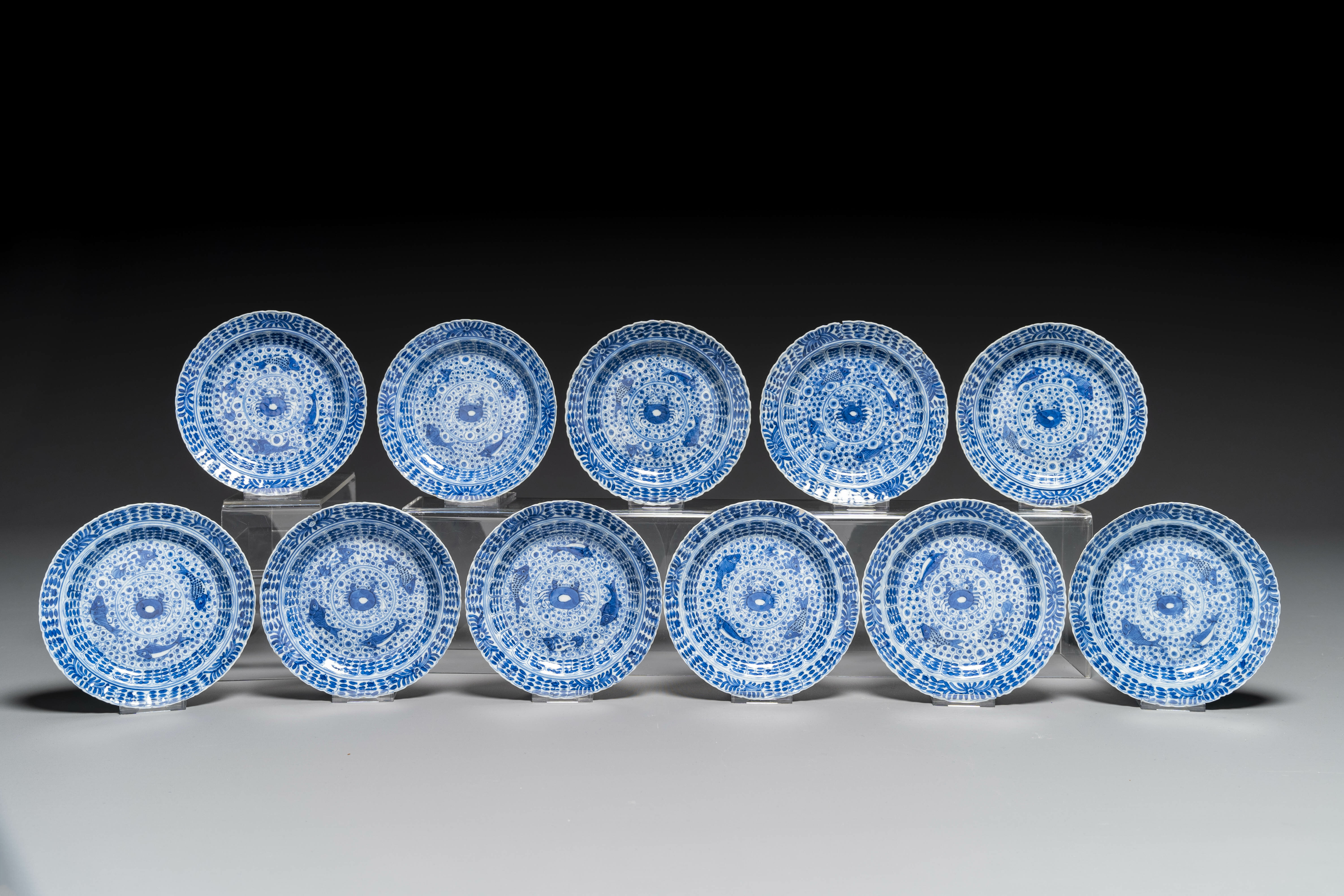 Eleven Chinese blue and white 'crab and fish' cups and saucers, Kangxi mark, Guangxu - Image 6 of 7