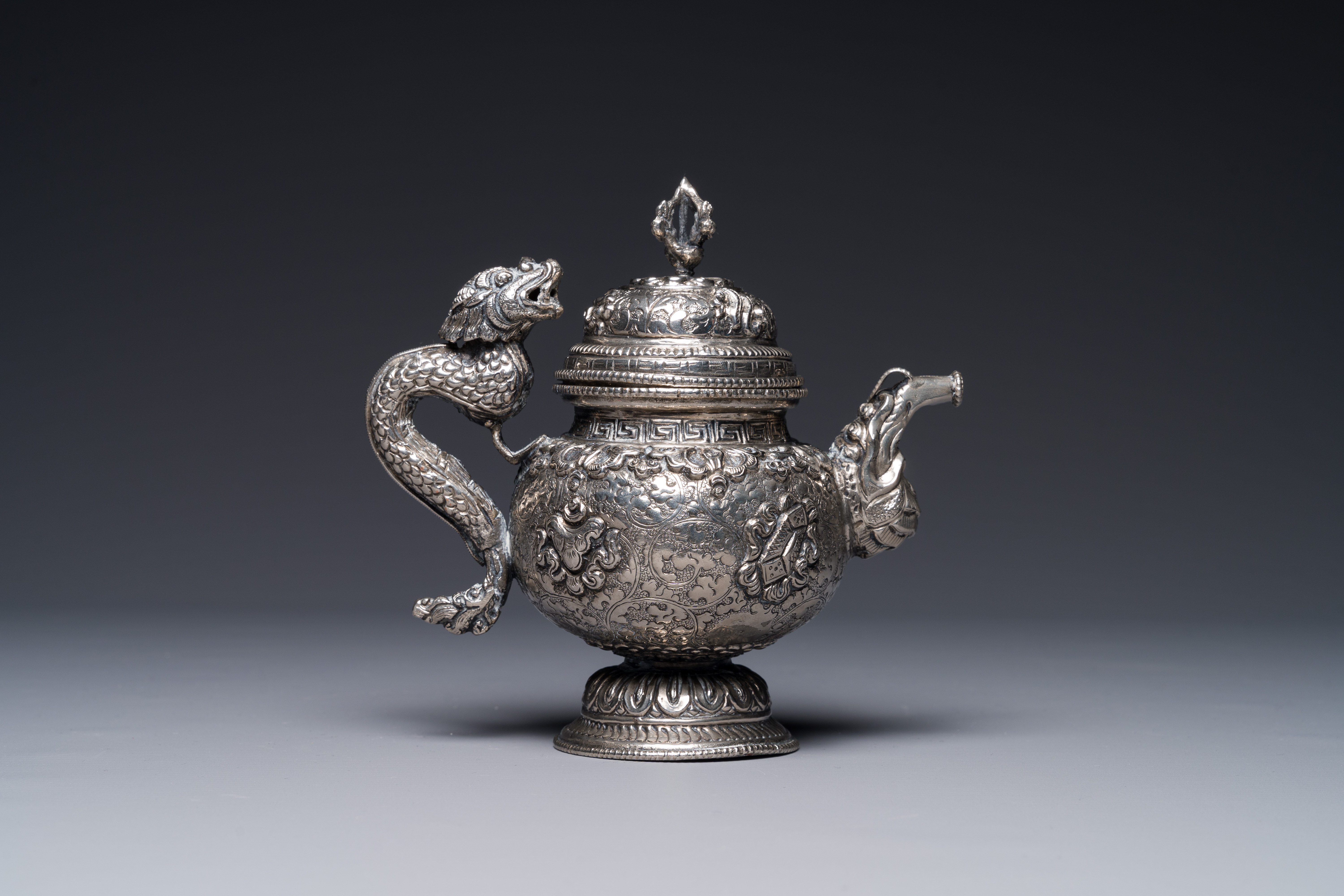 A fine Tibetan silver plated 'bajixiang' teapot, 19th C. - Image 2 of 4