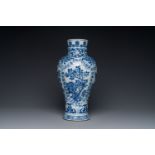 A Chinese blue and white baluster vase with floral decor, Kangxi