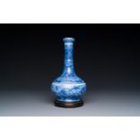 An exceptional Chinese blue and white 'mythic animals' garlic-mouth bottle vase on wooden stand, Kan