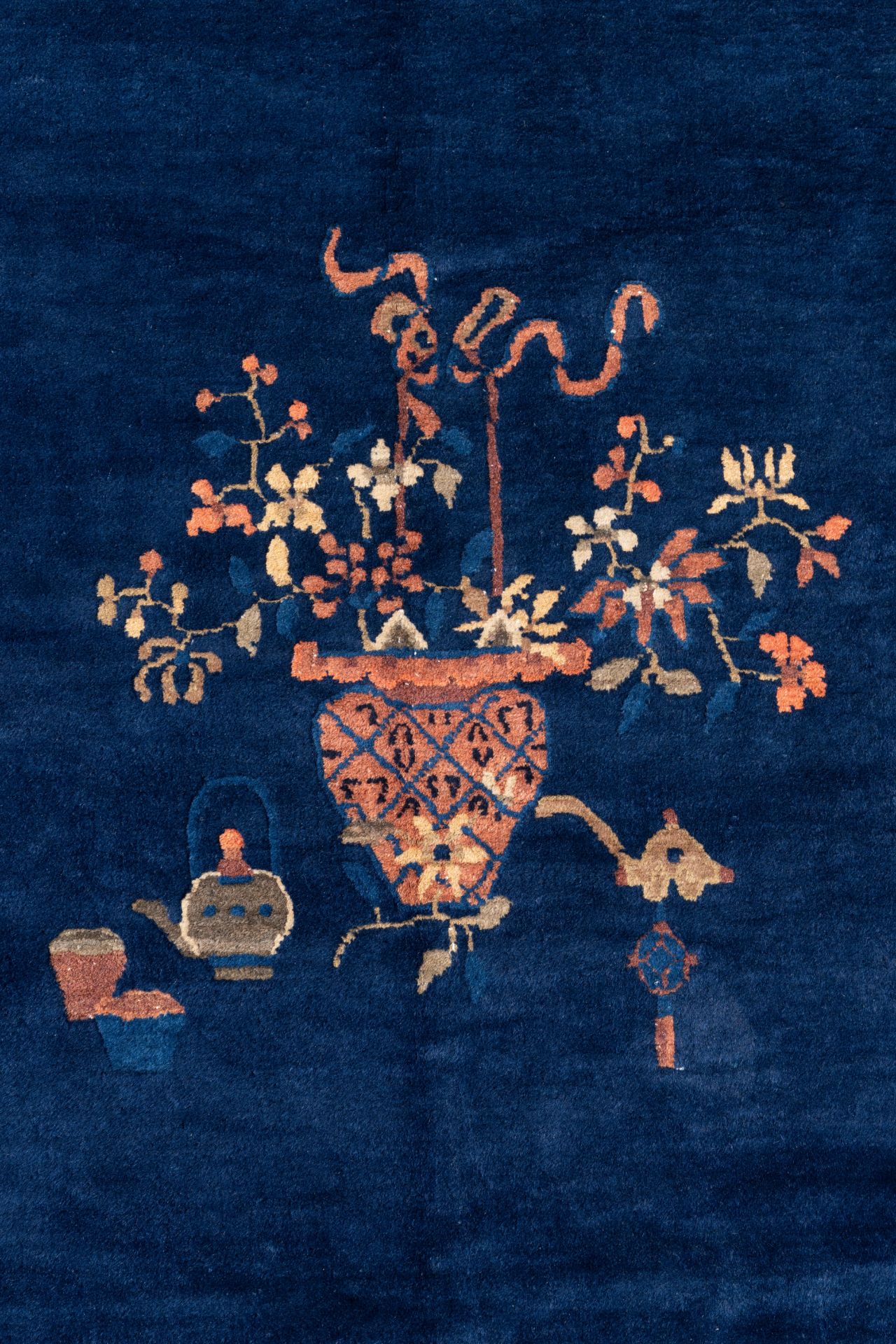 A large Chinese dark-blue-ground carpet with floral design, 19/20th century - Image 6 of 7