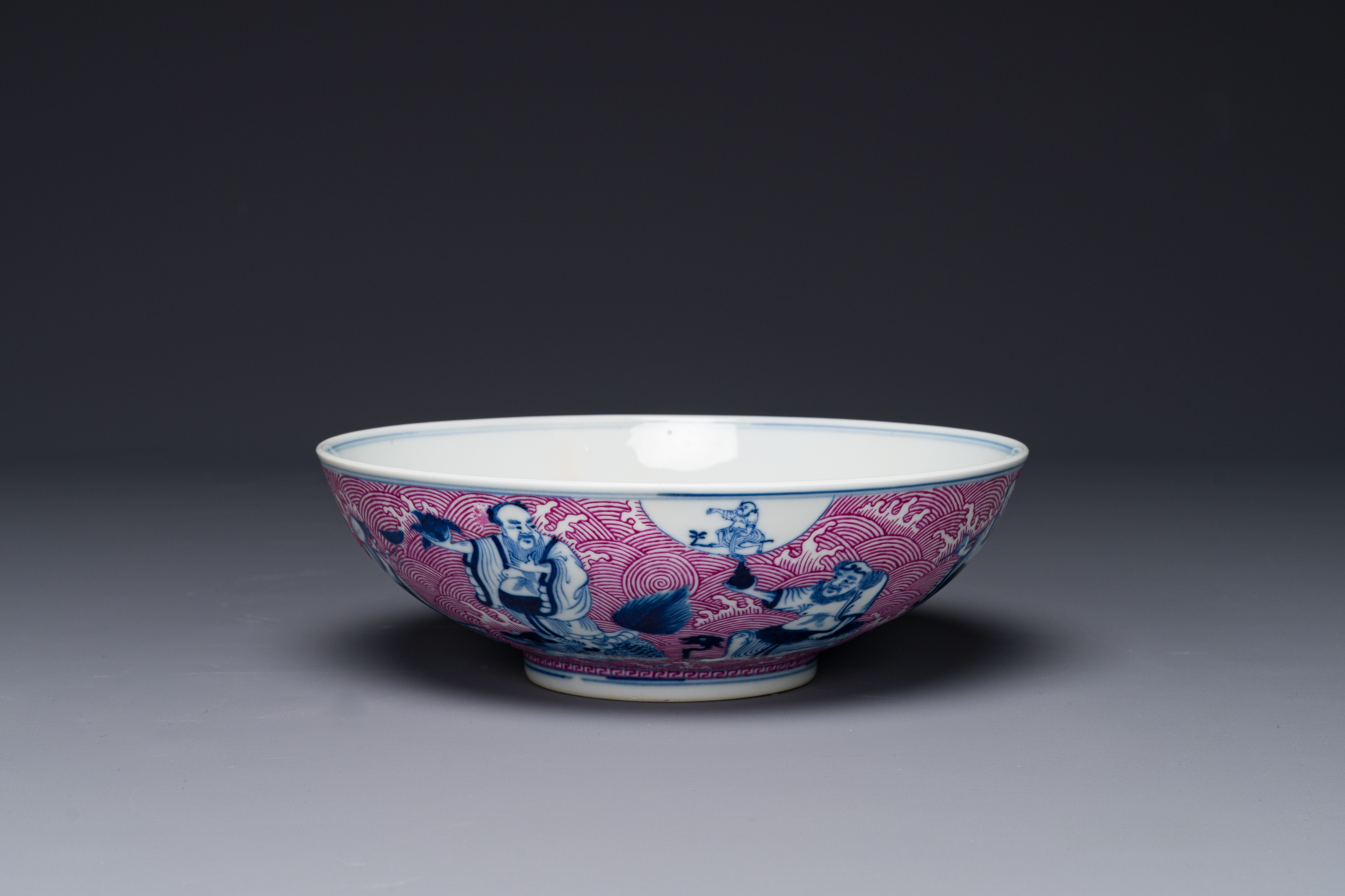 A Chinese blue, white and puce-enamelled 'Eight Immortals' bowl, Guangxu mark and of the period - Image 6 of 8