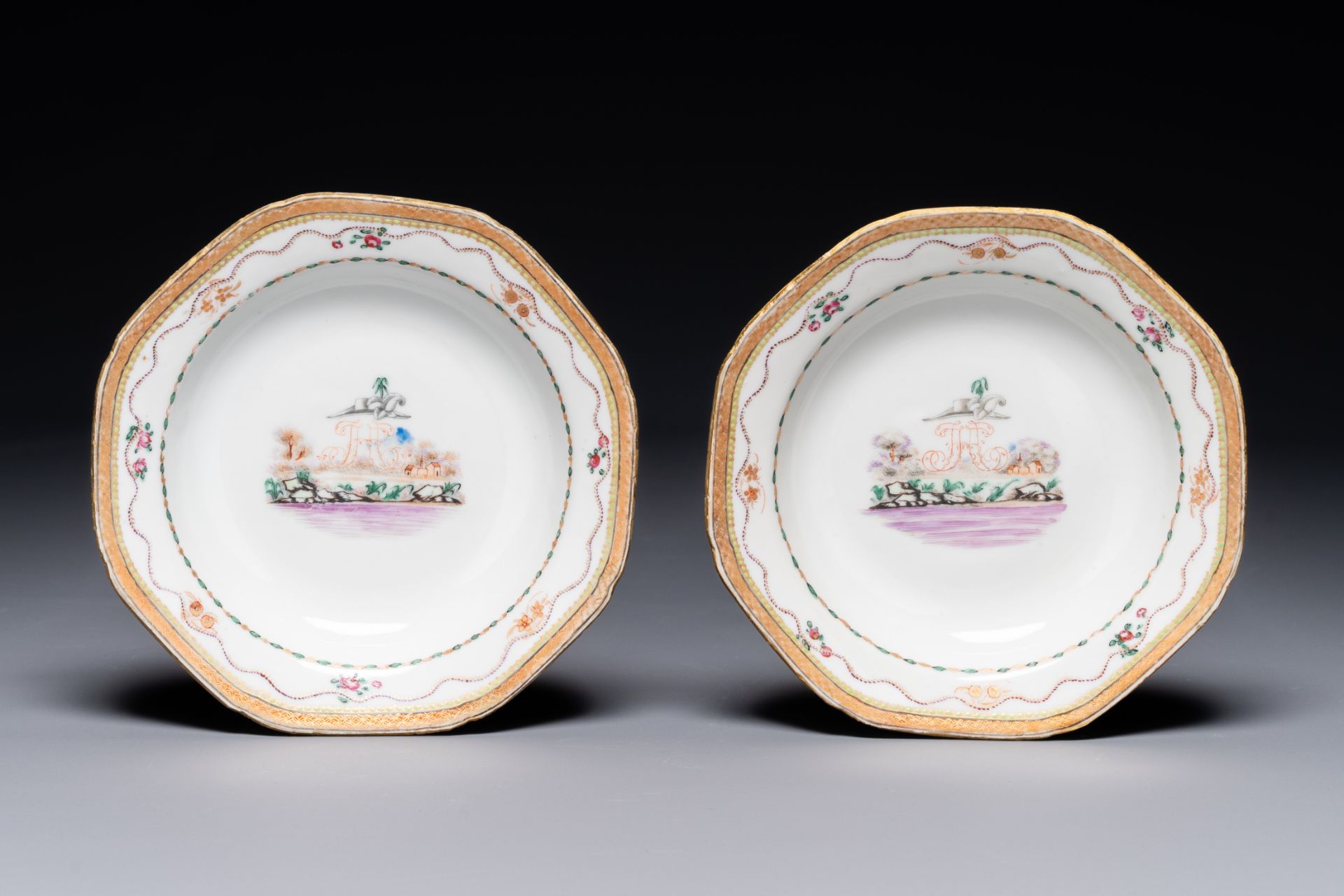 A pair of Chinese 'H' monogrammed famille rose plates with landscape design, Jiaqing