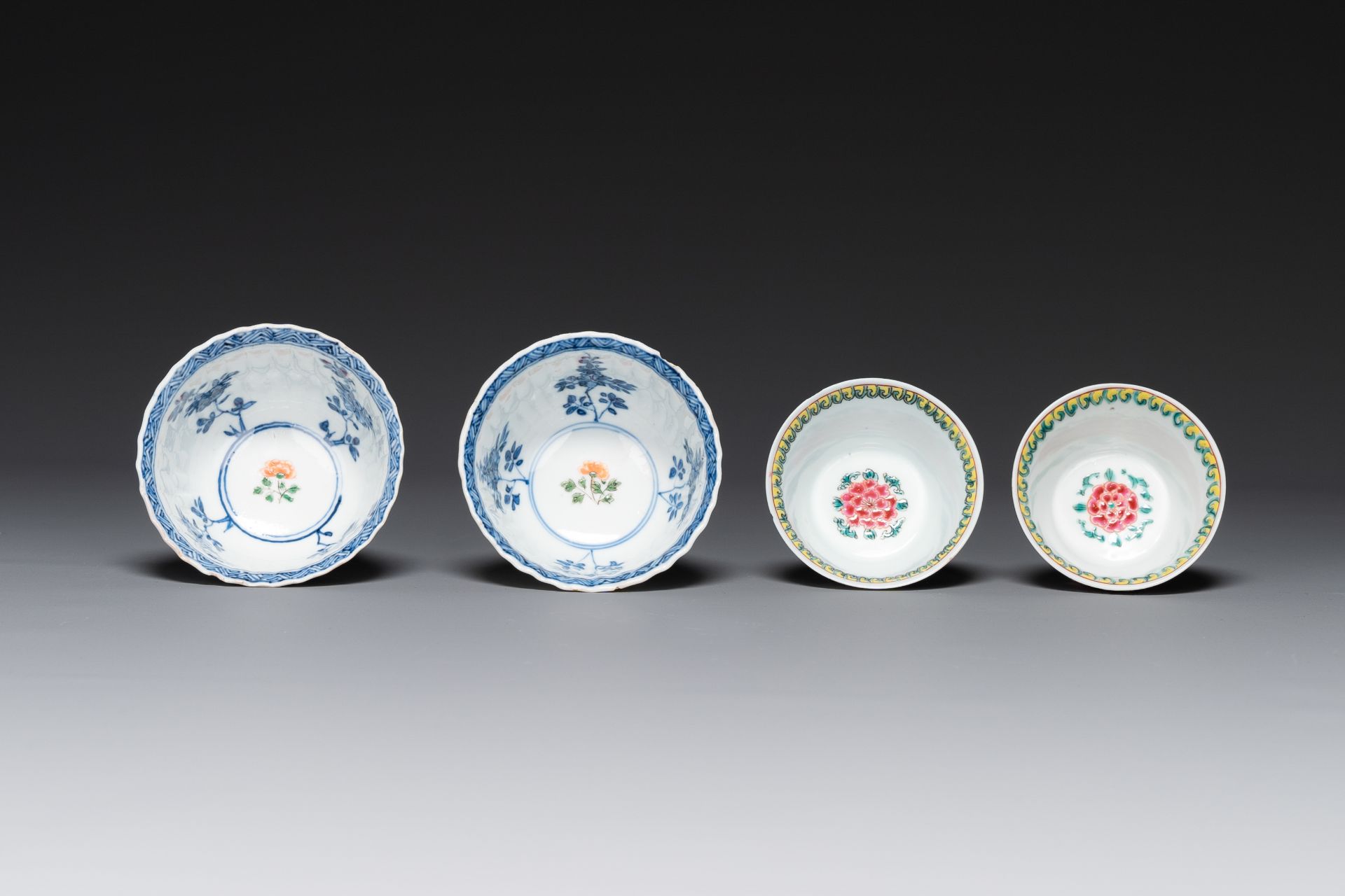 A pair of Chinese famille verte and a pair of famille rose cups and saucers, Kangxi/Yongzheng - Image 4 of 5
