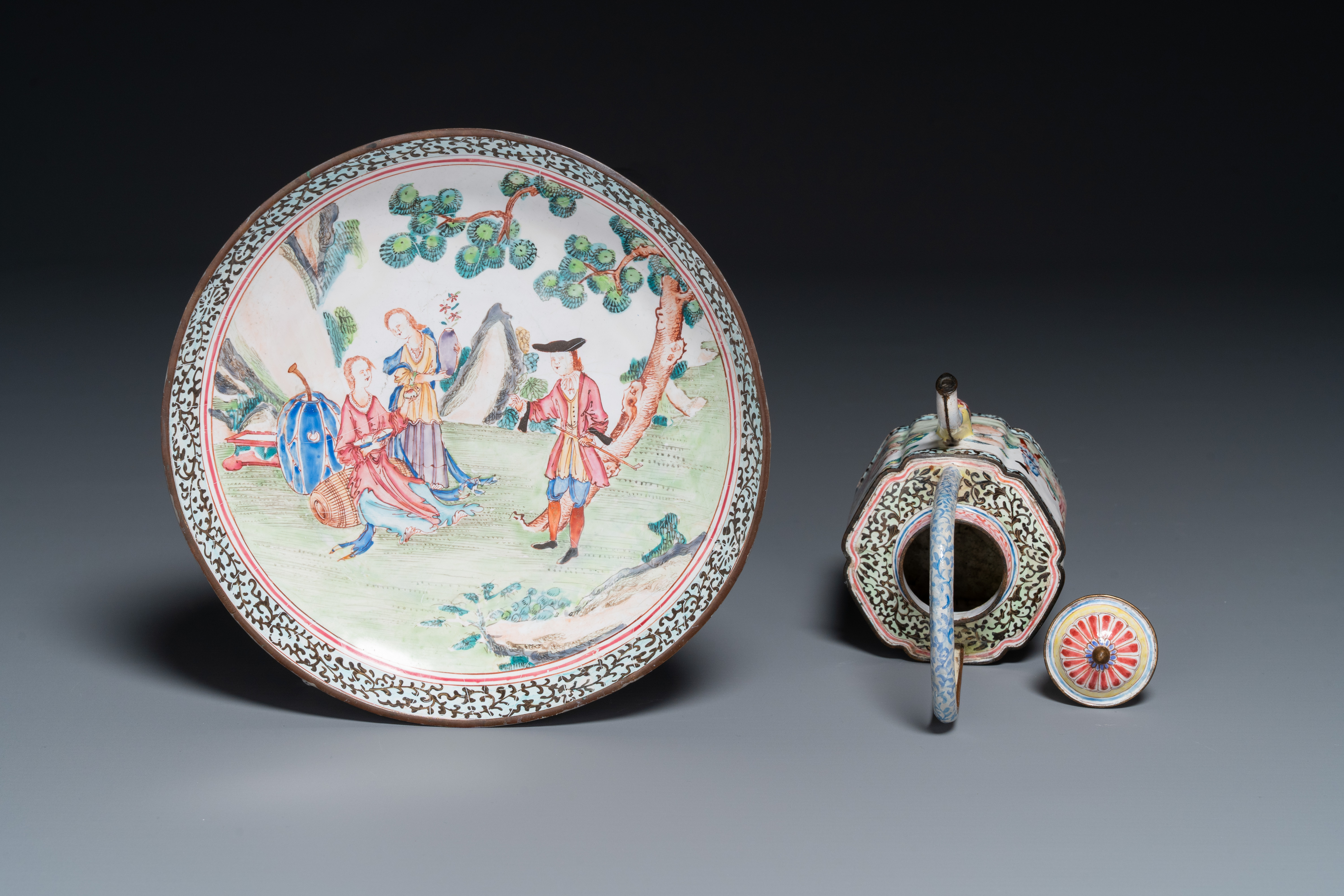 A Chinese Canton enamel 'European scene' plate and a teapot, Qianlong - Image 3 of 4