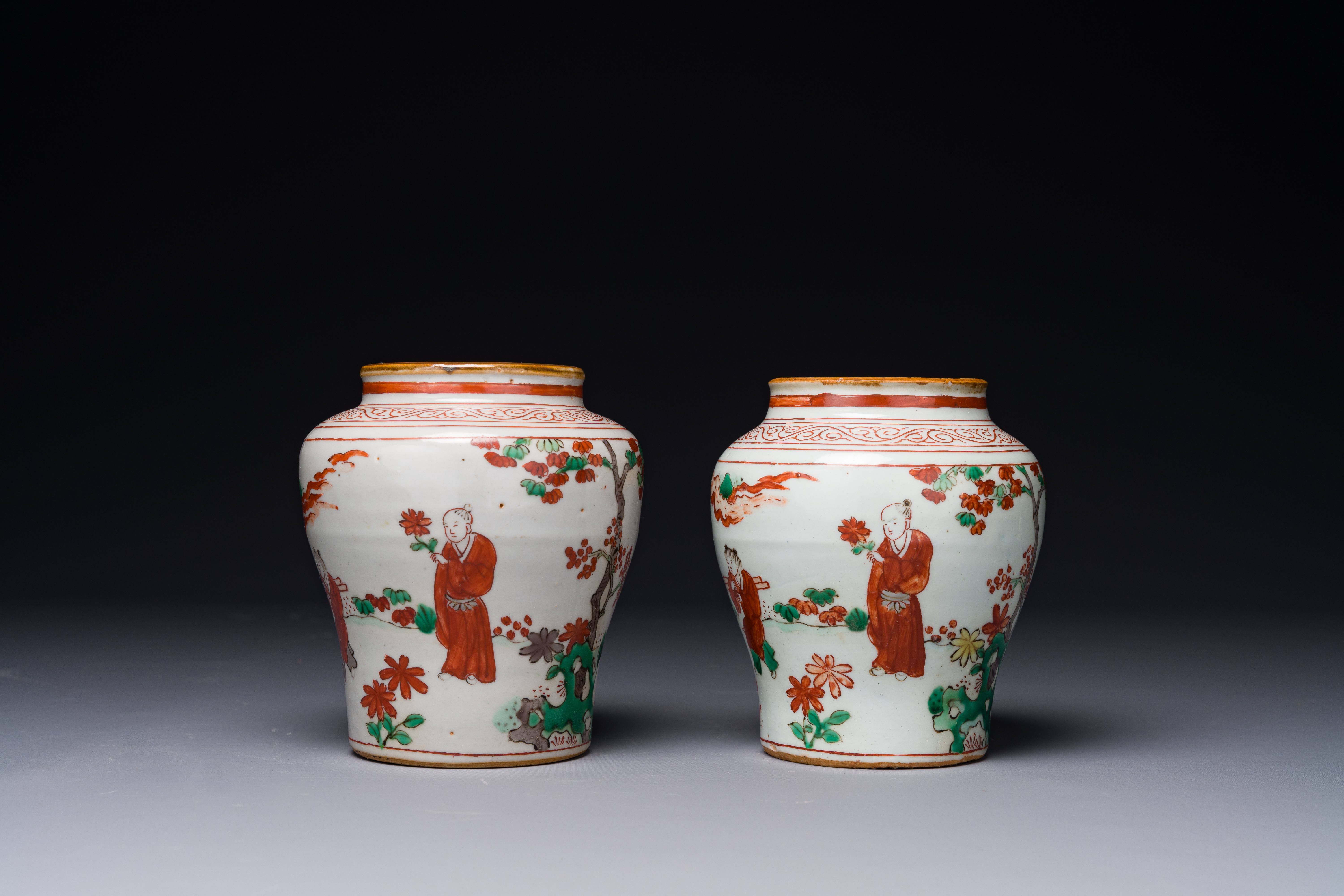 A pair of small Chinese wucai jars with figures in a landscape, Transition period - Image 3 of 6