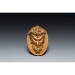 A terracotta head of a faun, signed Clodion, 19th C.