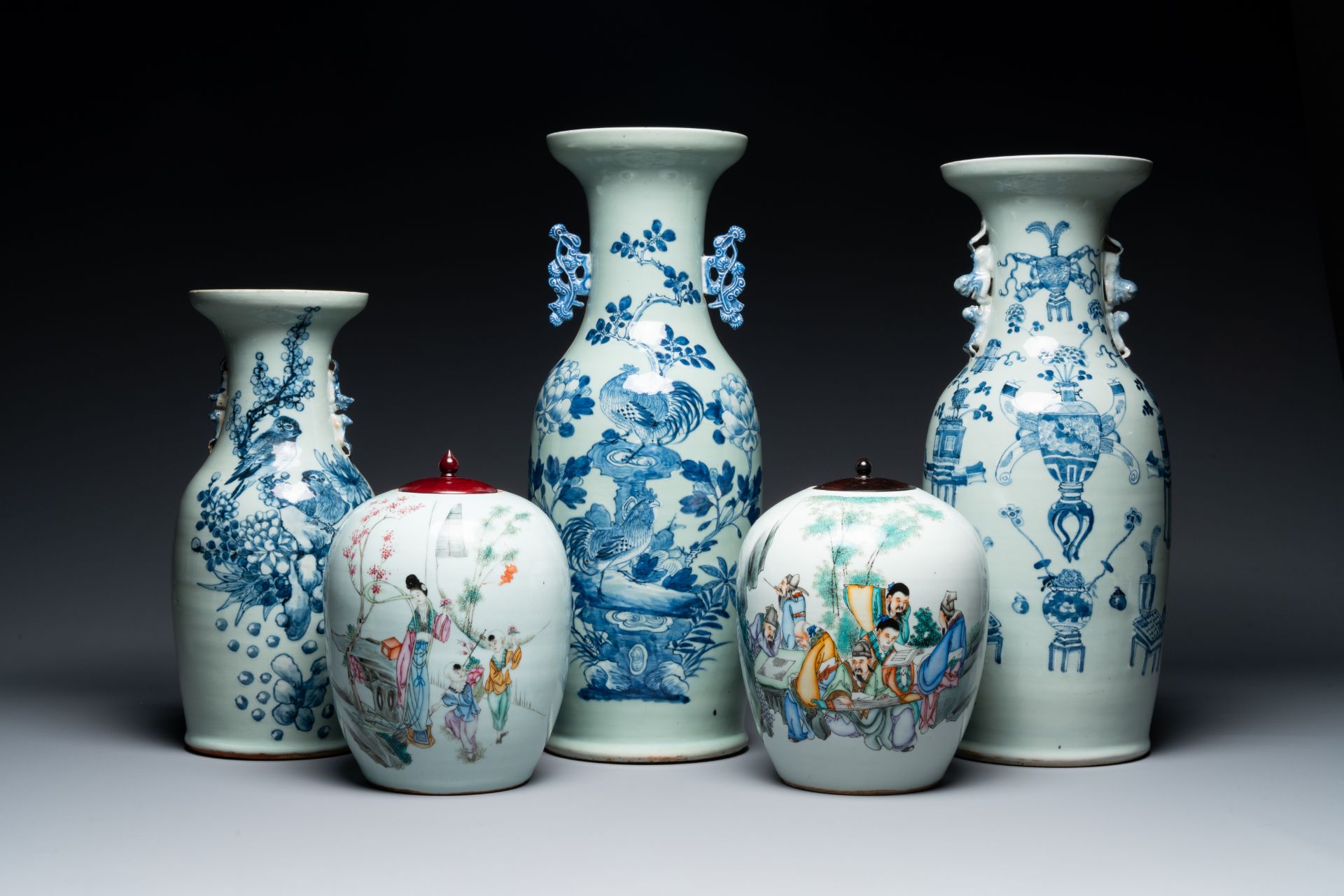 Three Chinese celadon-ground blue and white vases and two famille rose jars, 19/20th C.