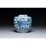 A Chinese blue and white 'Buddhist lion and lotus scroll' jar, Wanli