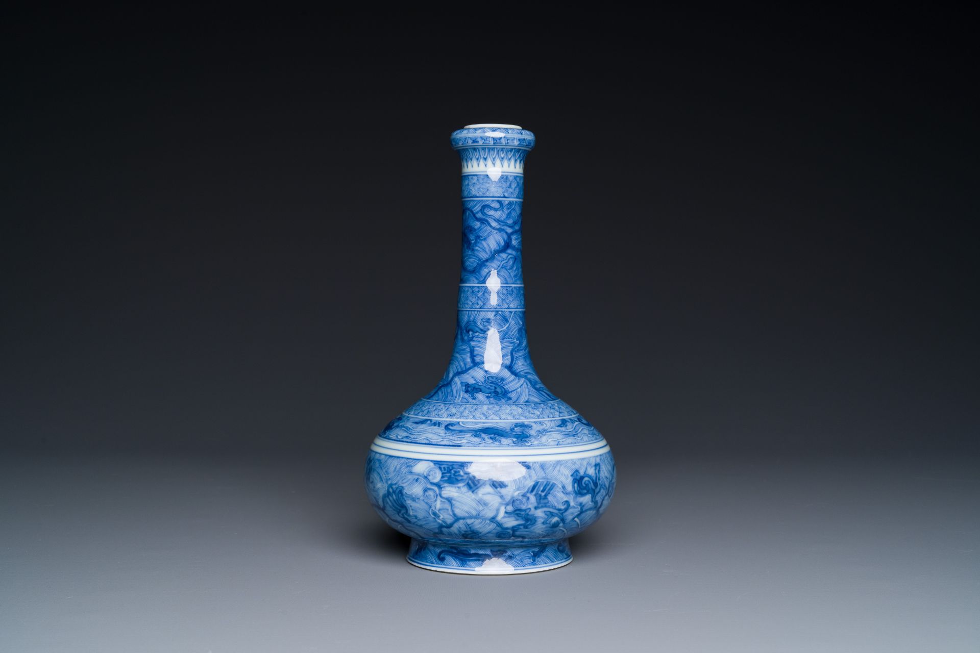 An exceptional Chinese blue and white 'mythic animals' garlic-mouth bottle vase on wooden stand, Kan - Image 5 of 10