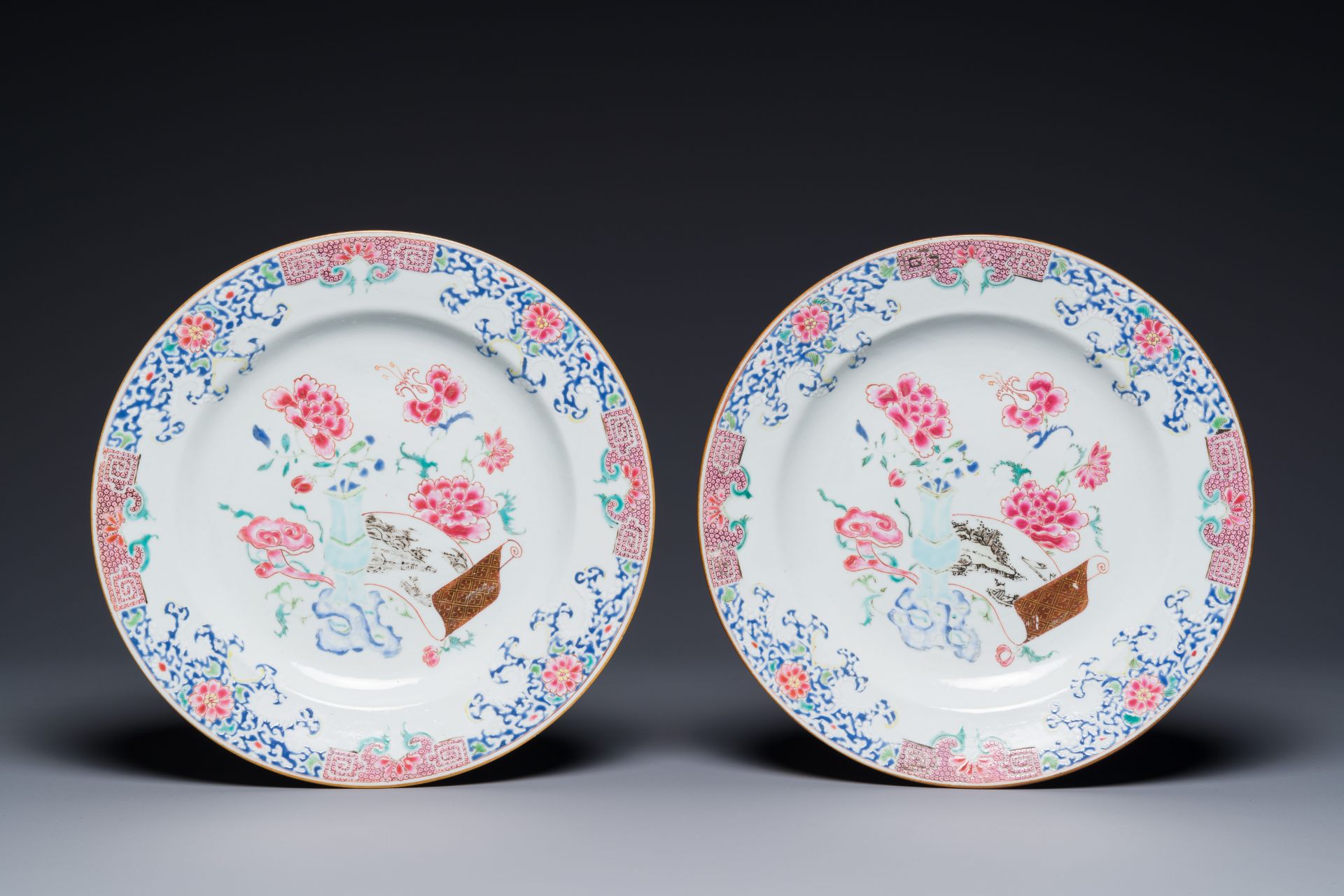 A pair of Chinese famille rose 'antiquities' dishes, Yongzheng