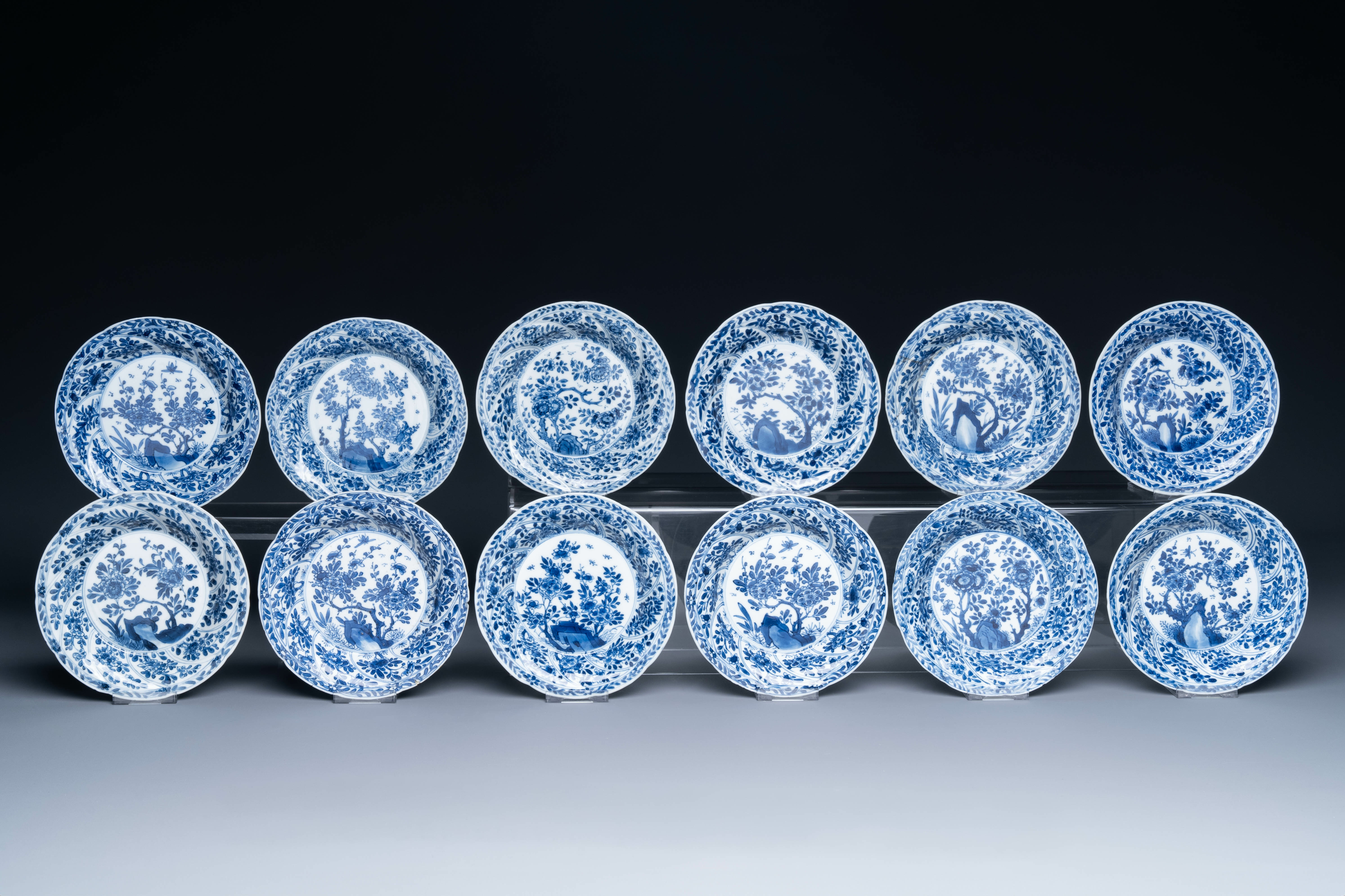 Twelve Chinese blue and white cups and saucers with floral design, jade mark, Kangxi - Image 2 of 7