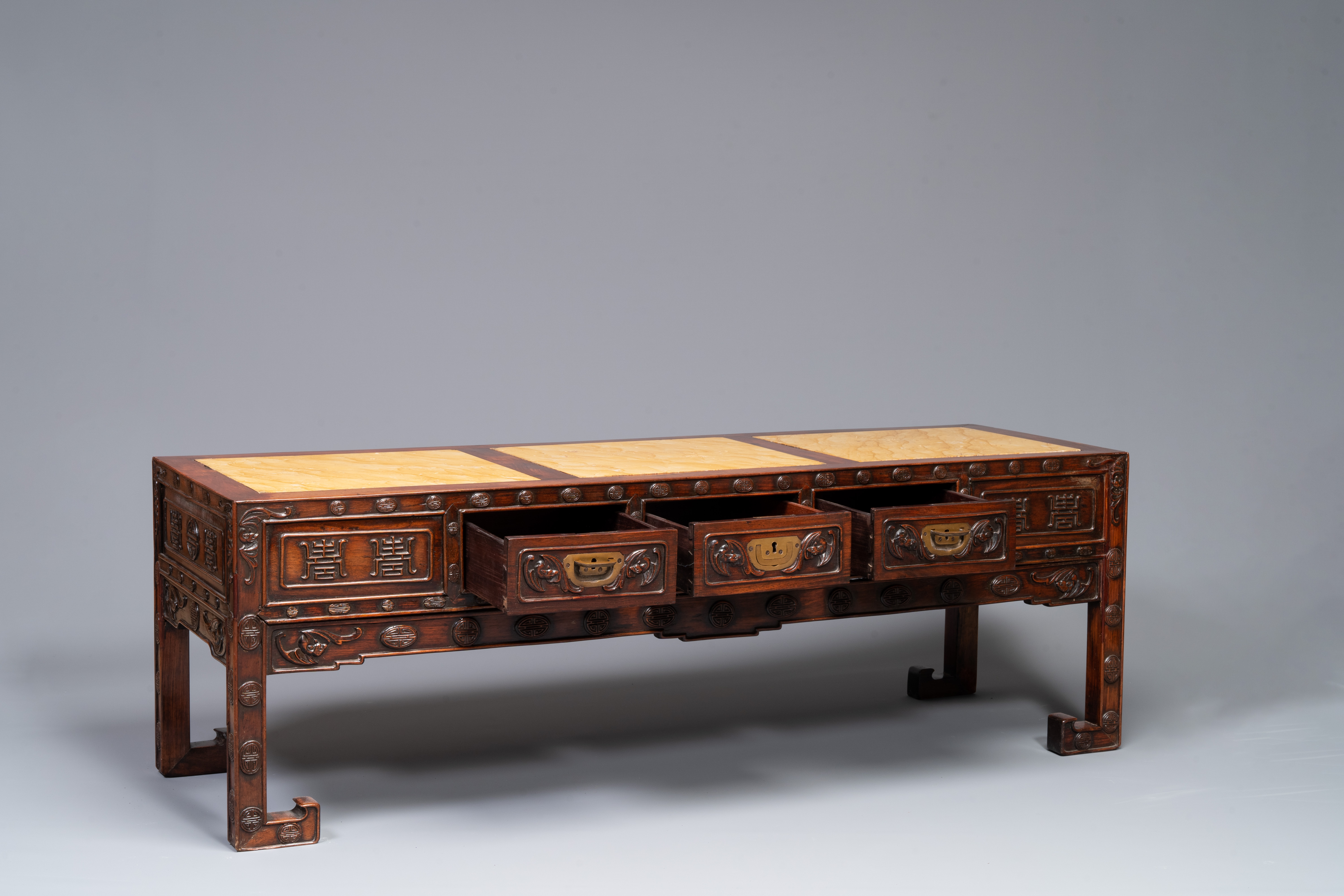 A Chinese carved wooden stand and a low table with marble tops, 19th C. - Image 3 of 10