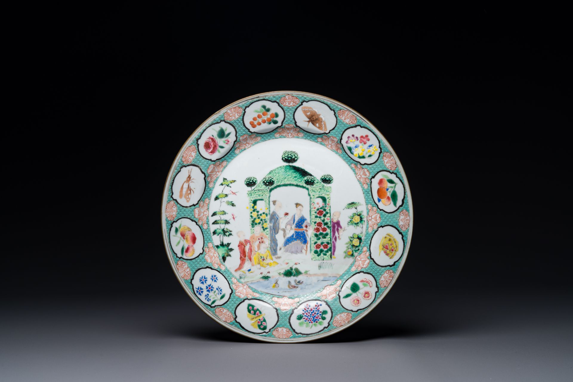 A Chinese famille rose 'arbor' plate after a design by Cornelis Pronk, Qianlong