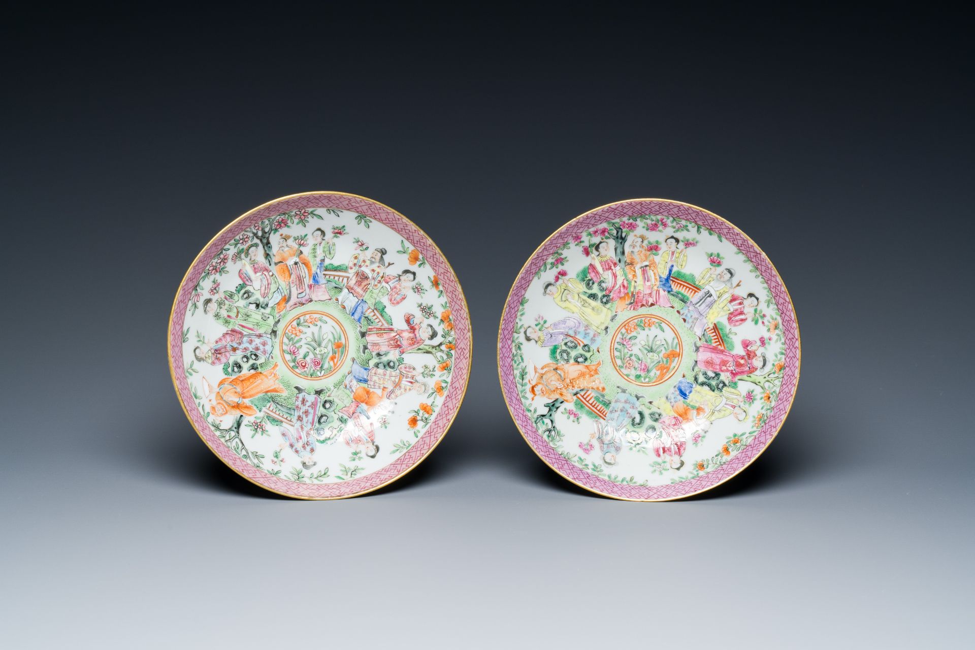 A pair of Chinese Canton famille rose cups and saucers, 19th C. - Image 2 of 9