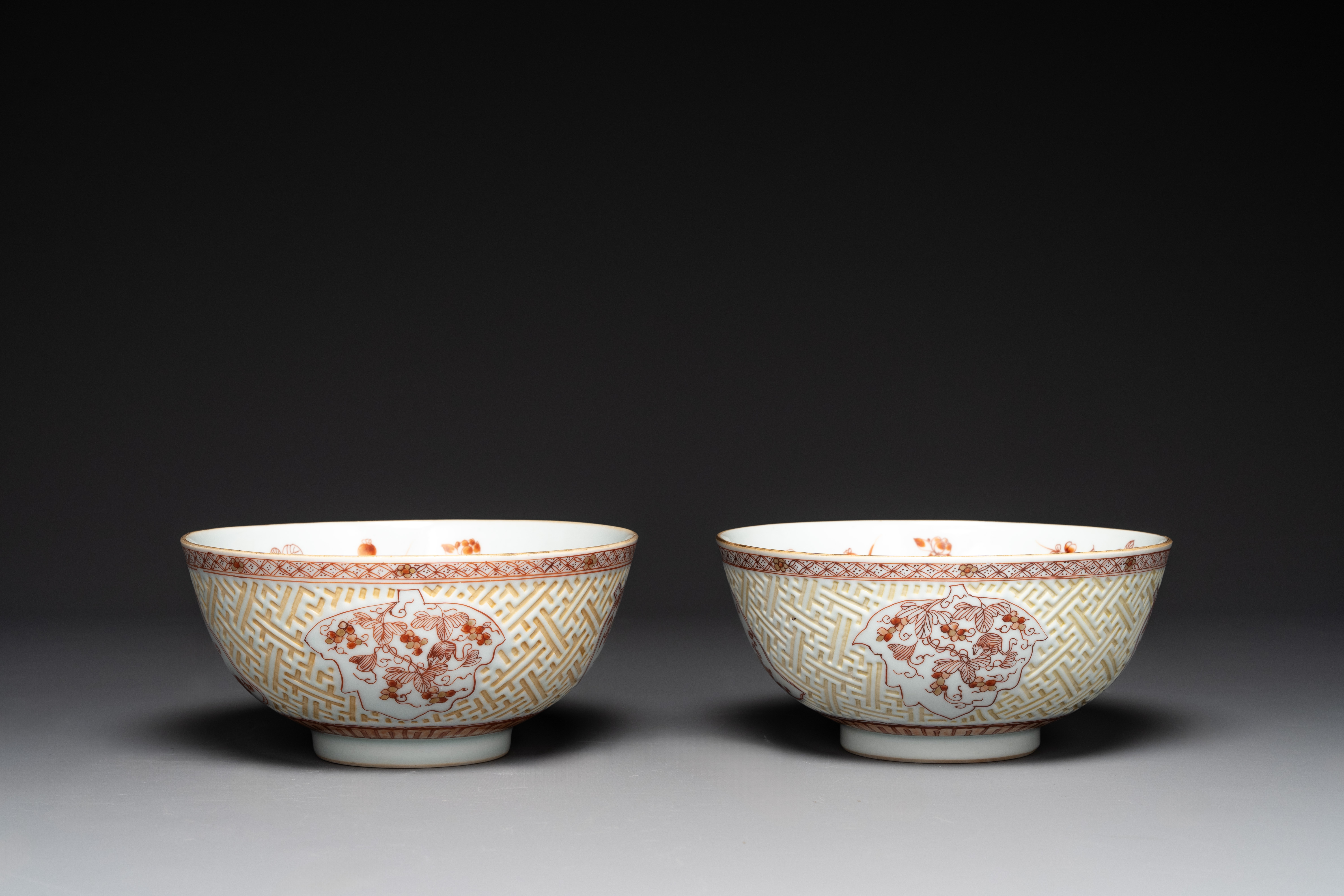 A pair of Chinese iron-red-decorated and gilt bowls with relief design, Kangxi - Image 5 of 8