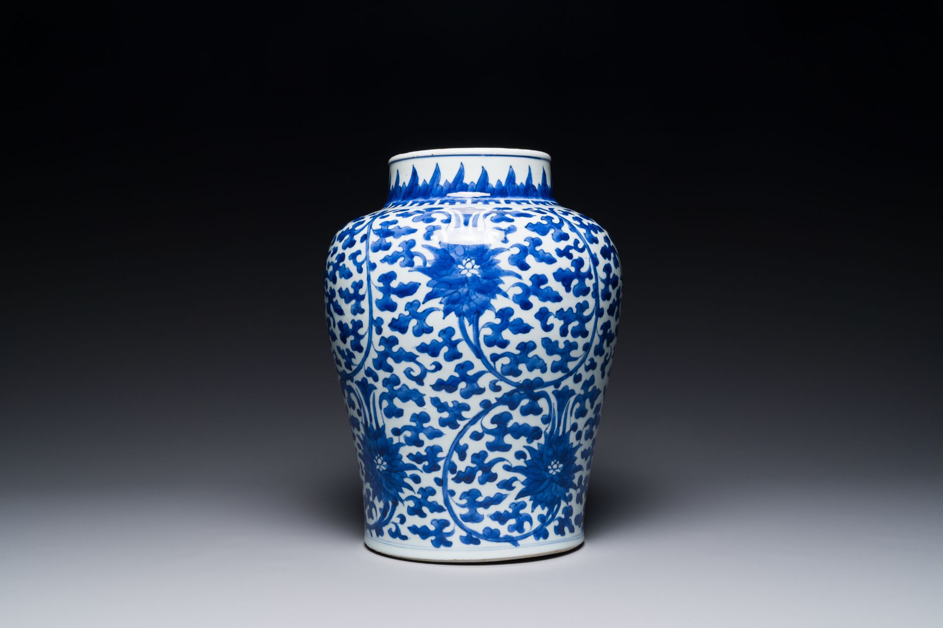 A Chinese blue and white 'lotus scroll' jar with wooden cover and stand, Kangxi - Image 3 of 5