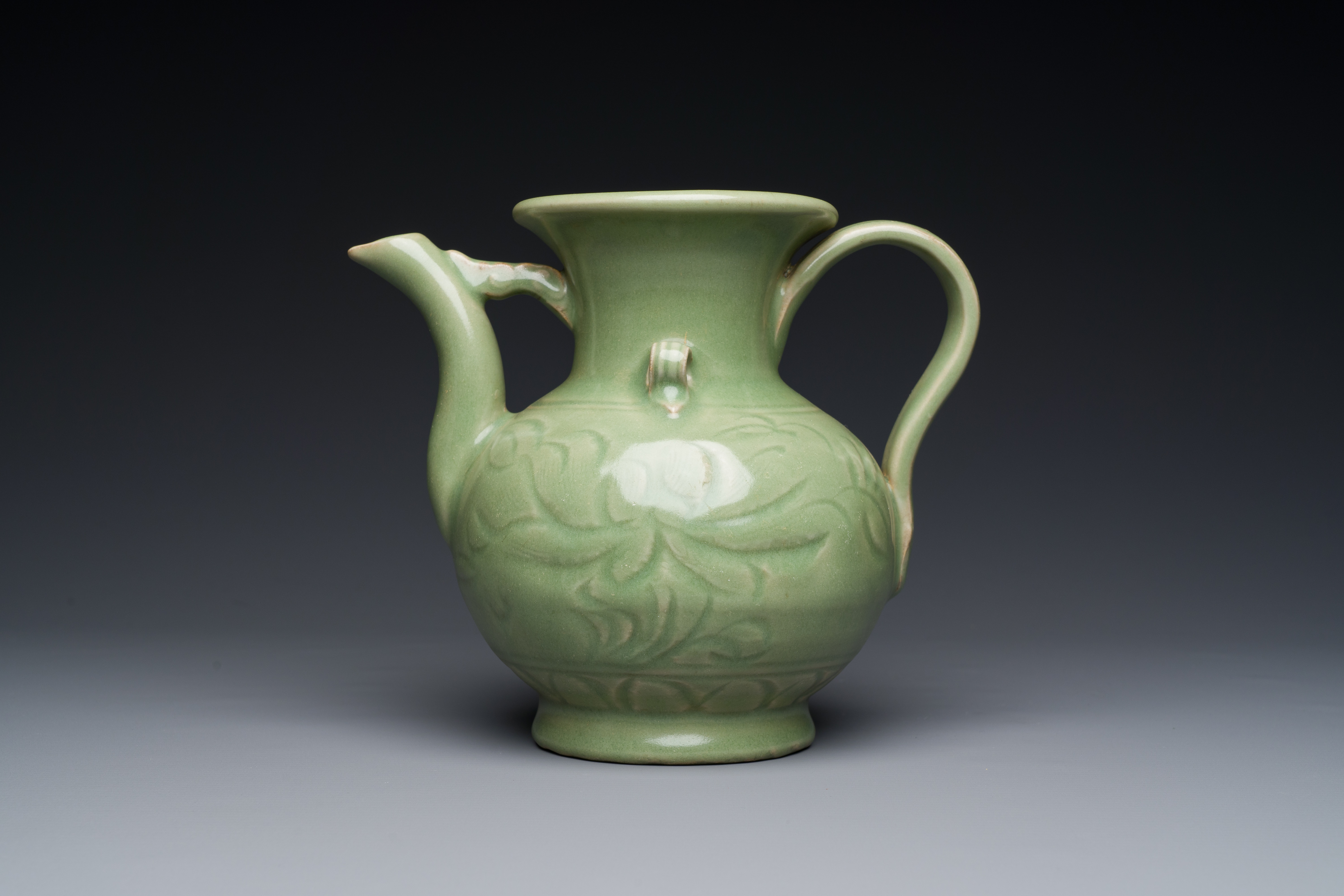 A Chinese Longquan celadon wine ewer with anhua design, Yuan/Ming - Image 2 of 7