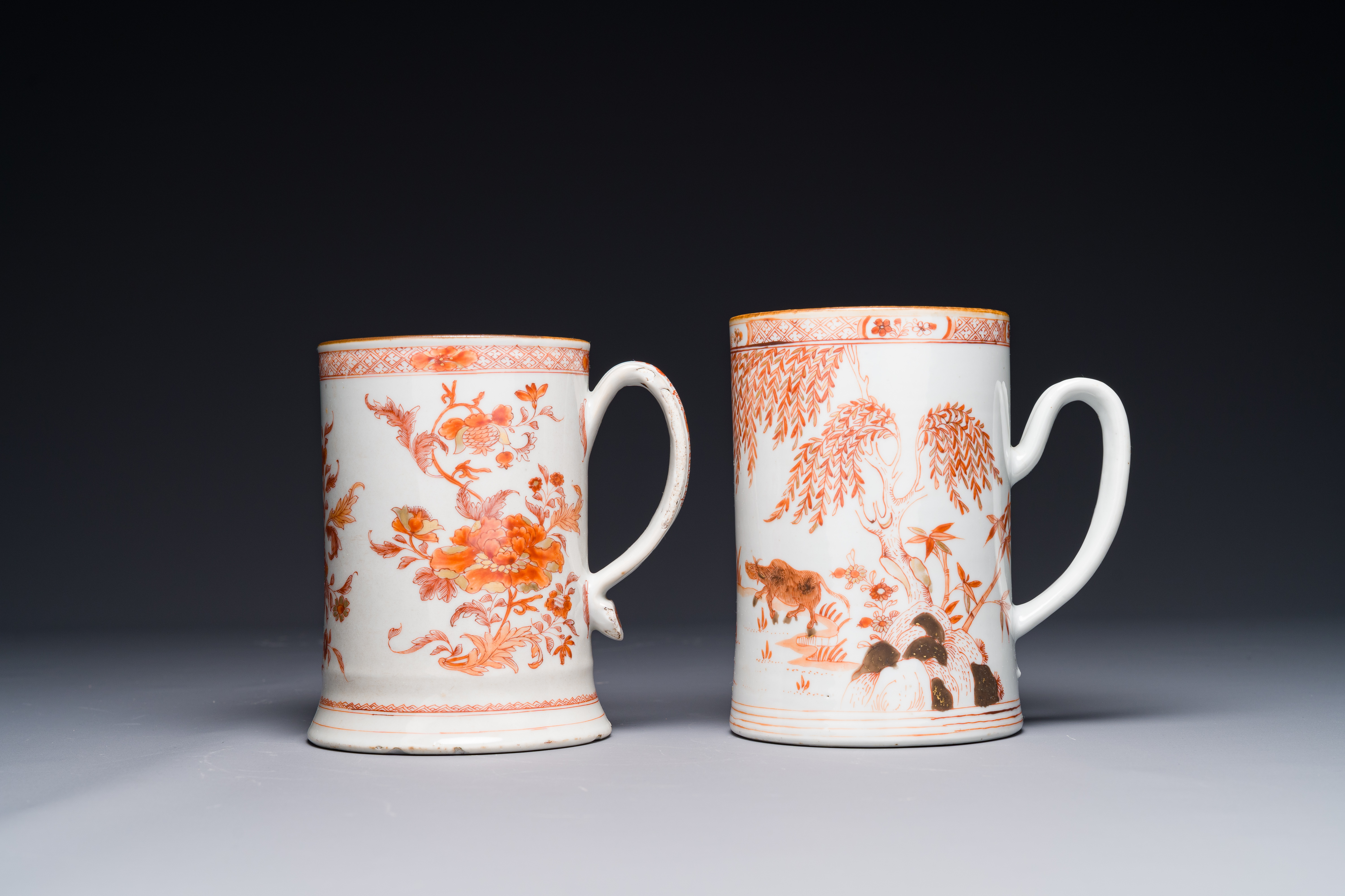 Two Chinese iron-red-decorated and gilded mugs, Yongzheng/Qianlong