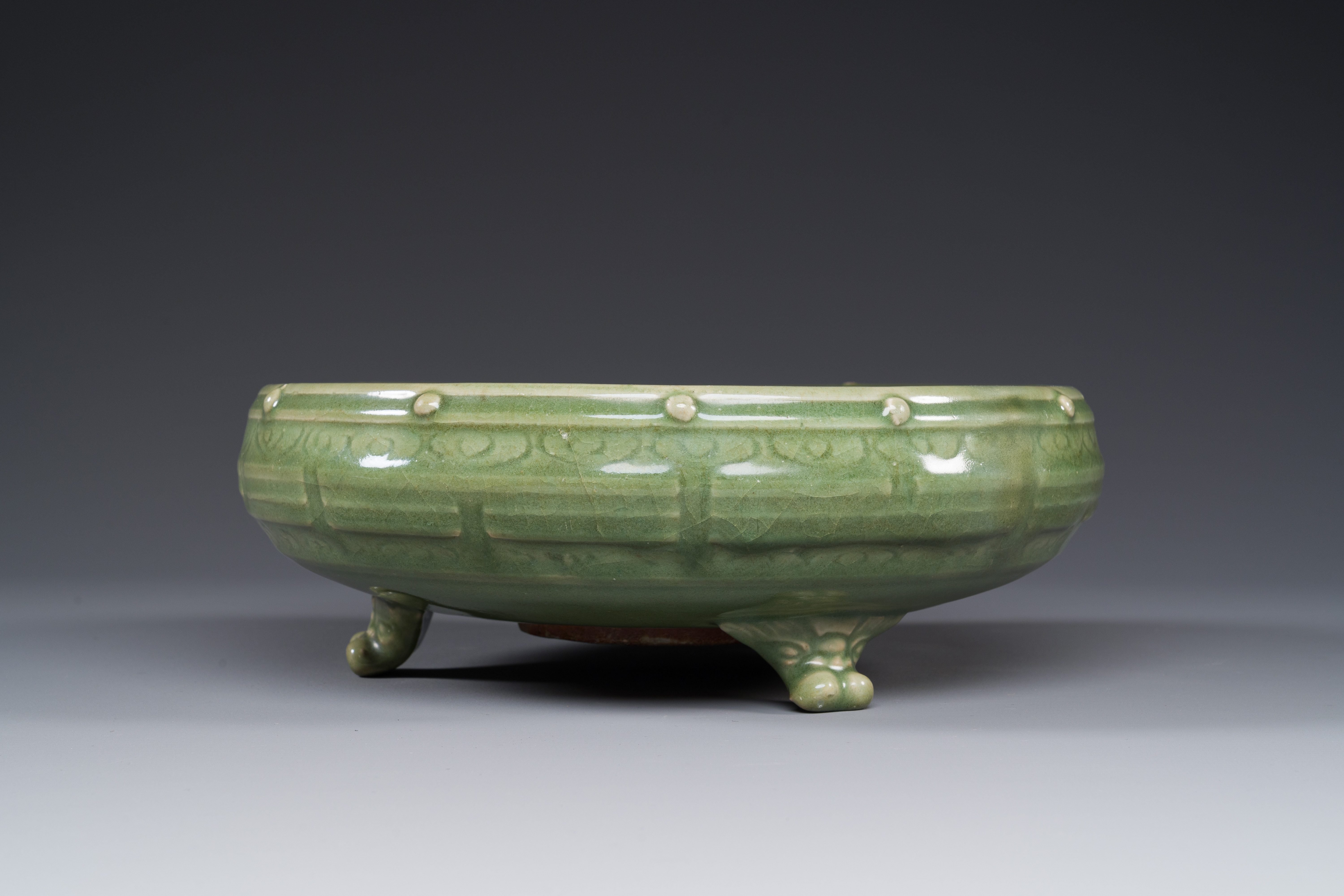 A Chinese Longquan celadon tripod censer on wooden stand, Yuan/Ming - Image 3 of 10