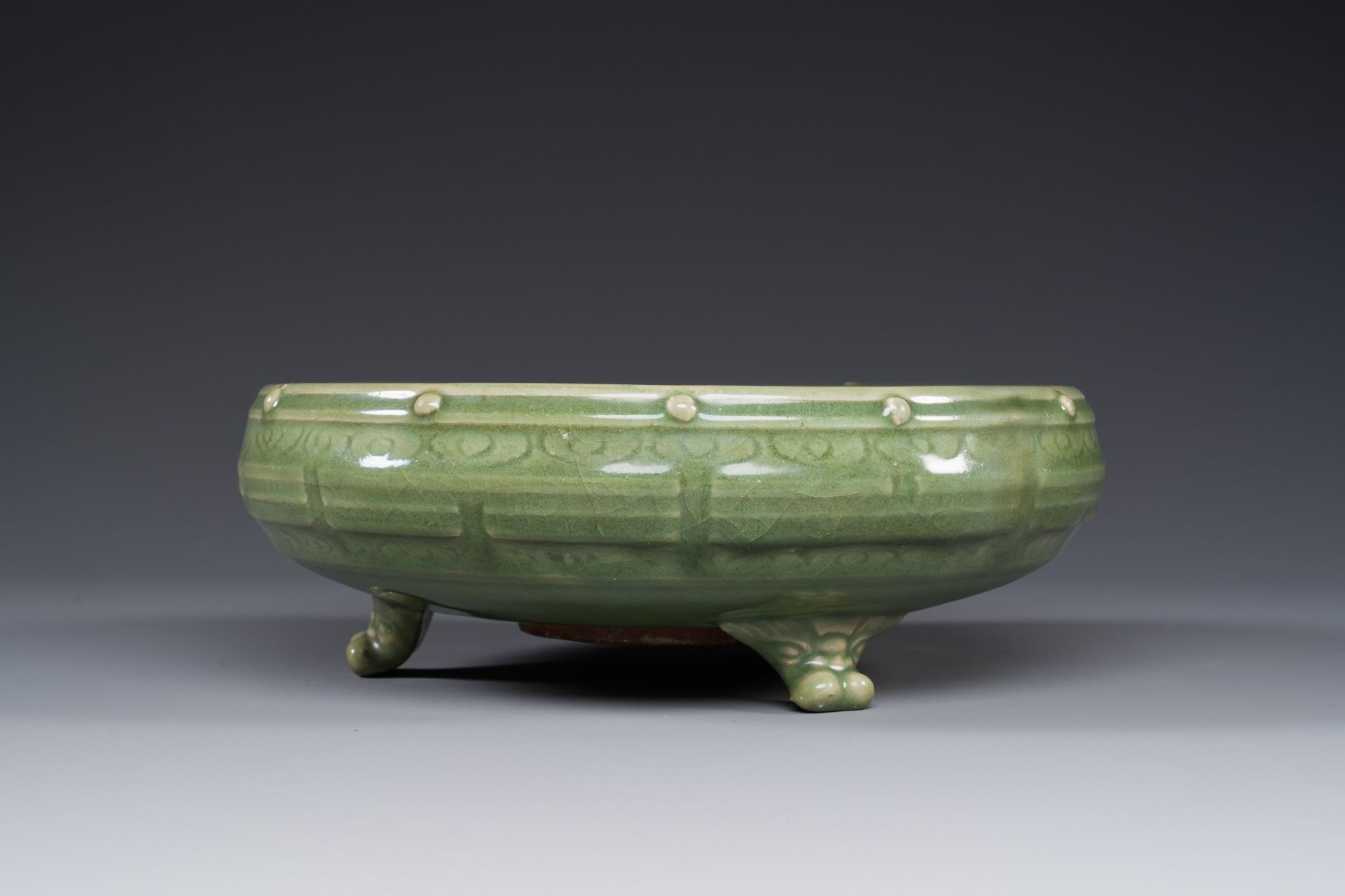 A Chinese Longquan celadon tripod censer on wooden stand, Yuan/Ming - Image 3 of 10