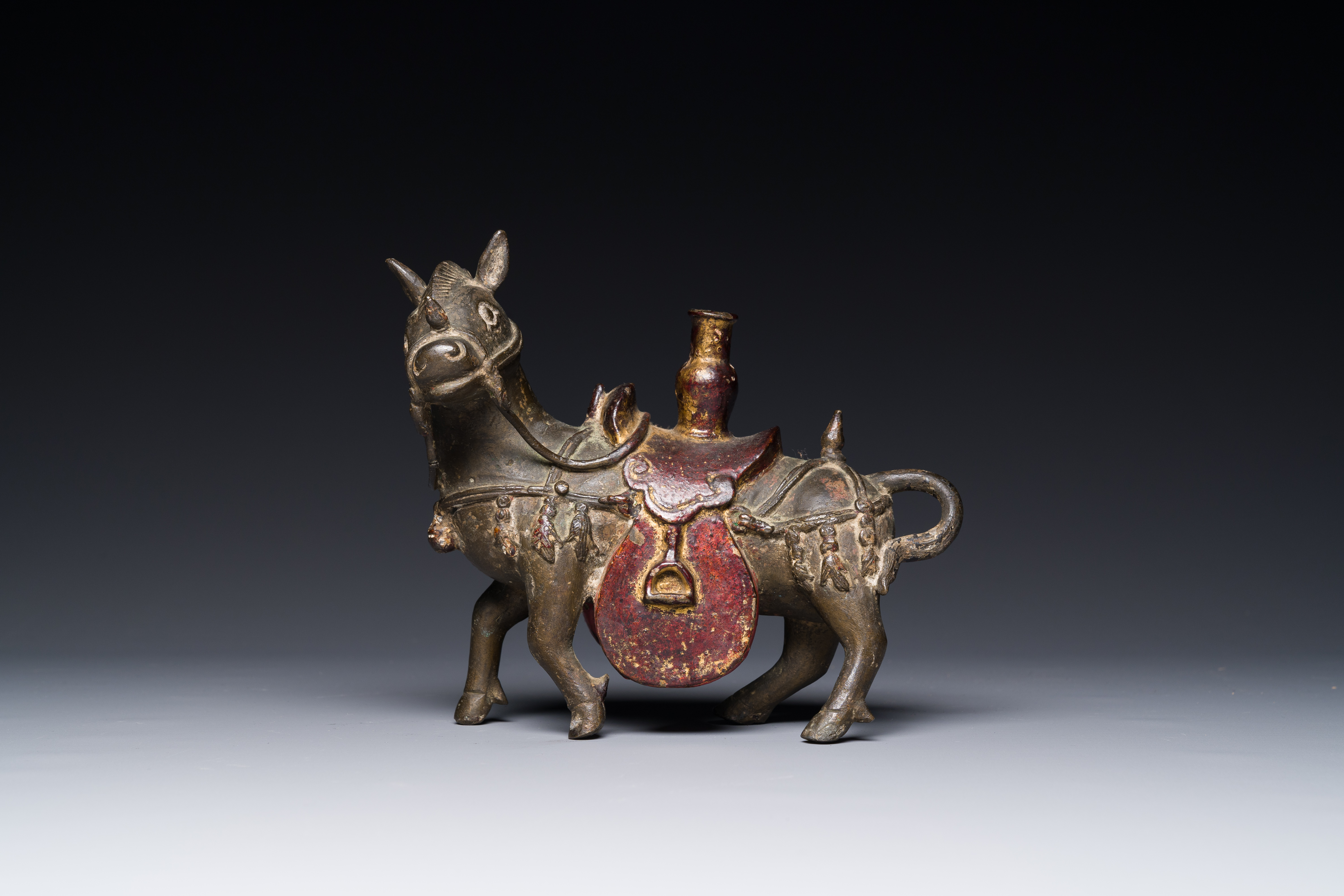 A rare Chinese partly lacquered and gilt bronze incense holder in the shape of a horse, Yuan/early M - Image 2 of 7
