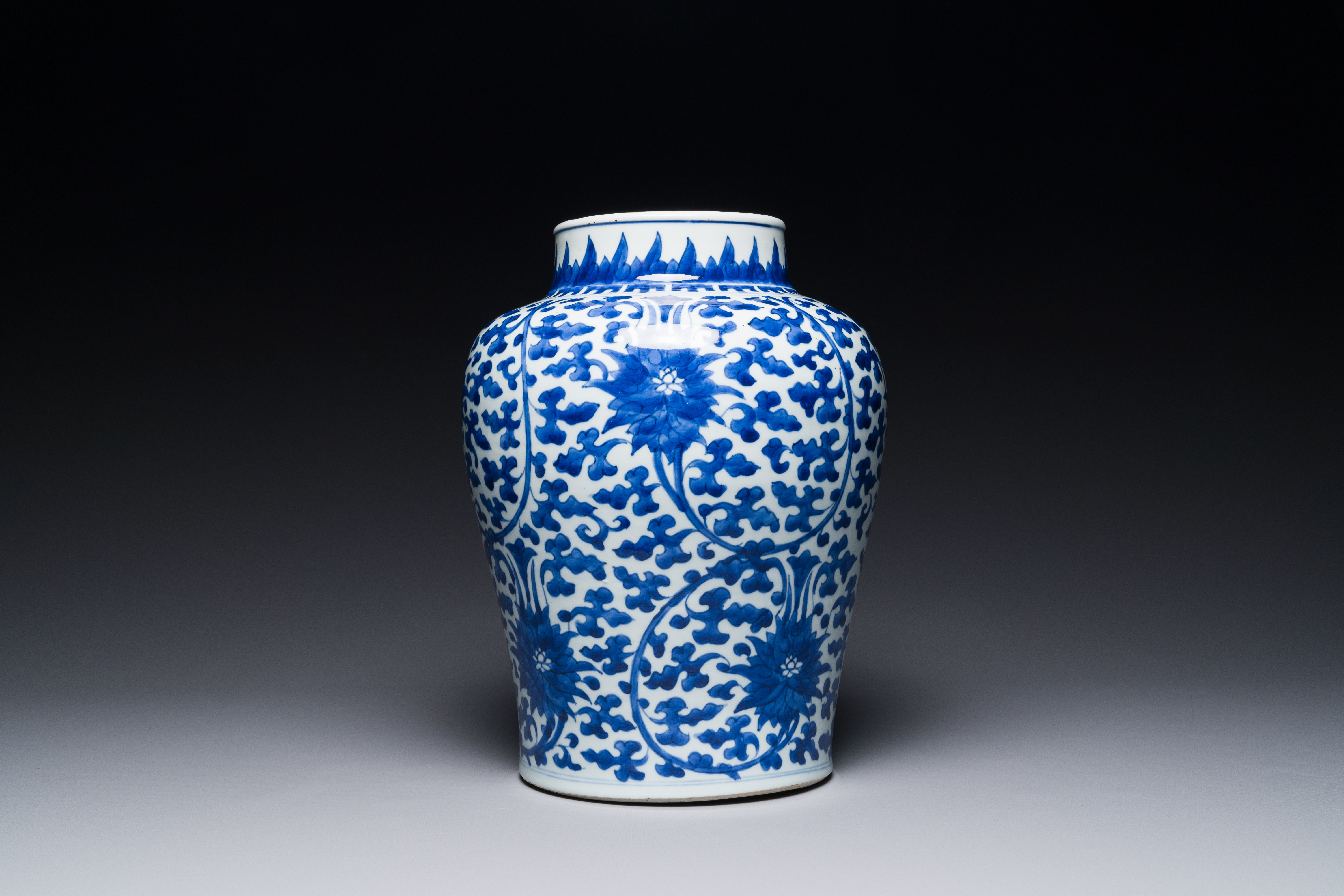 A Chinese blue and white 'lotus scroll' jar with wooden cover and stand, Kangxi - Image 2 of 5