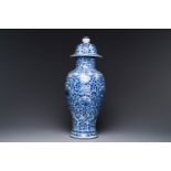 A Chinese blue and white vase and cover with floral design, Kangxi