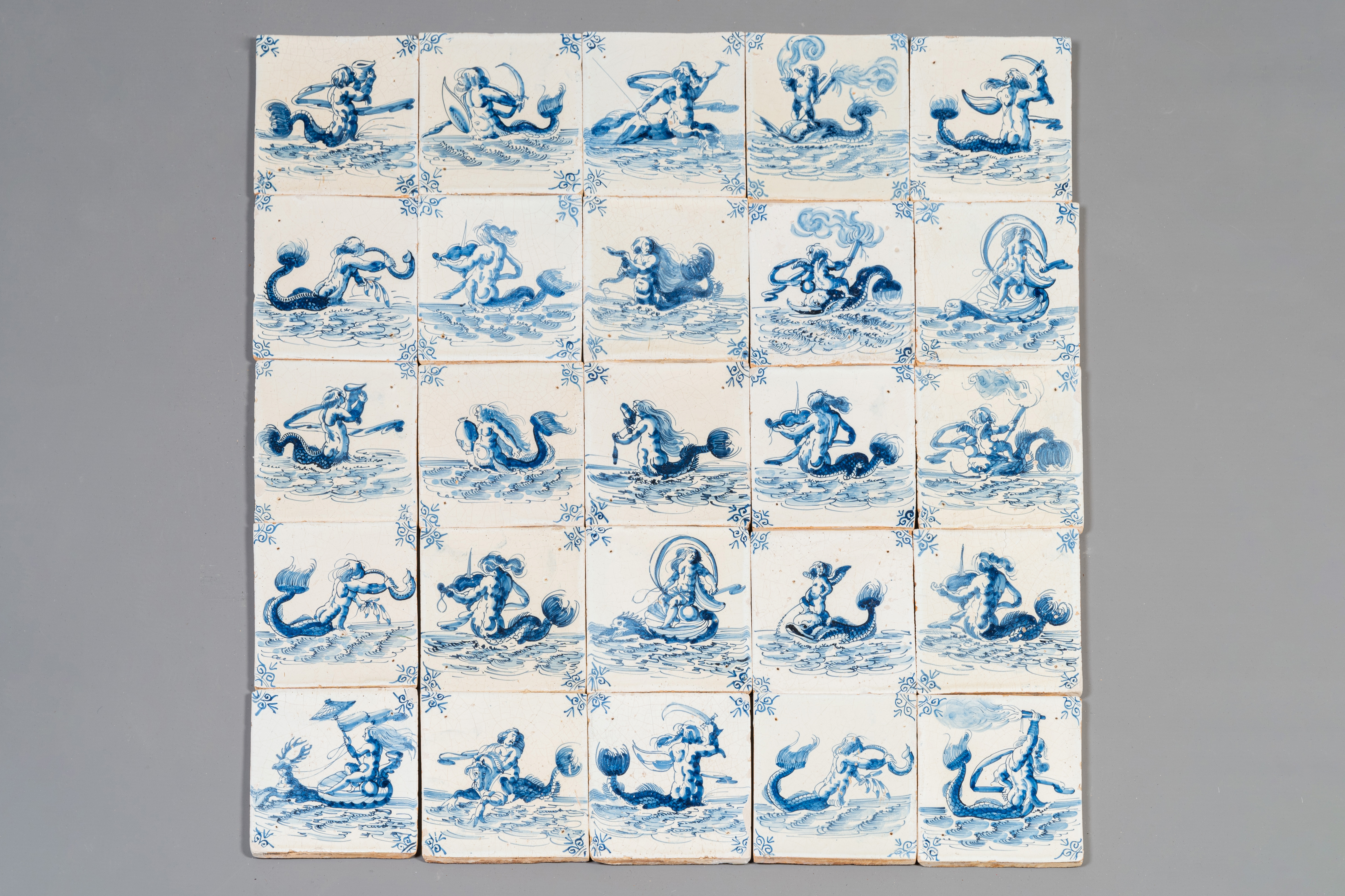 An exceptional set of 25 Dutch Delft blue and white tiles with fine sea monsters, Harlingen, Friesla