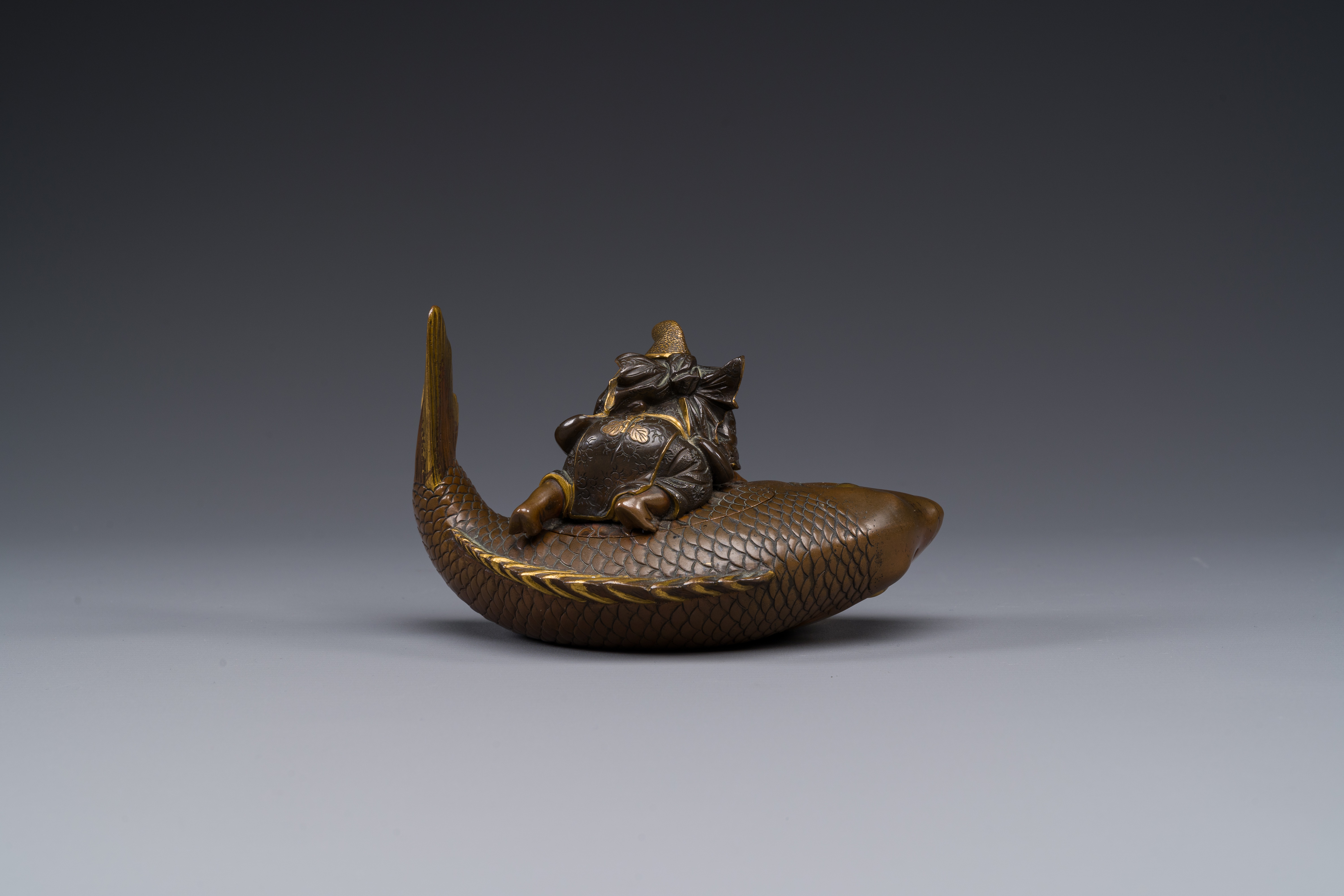 A Japanese partly gilded bronze lidded box in the shape of Ebisu on sea bream, signed Miyao Zo, Meij - Image 4 of 10
