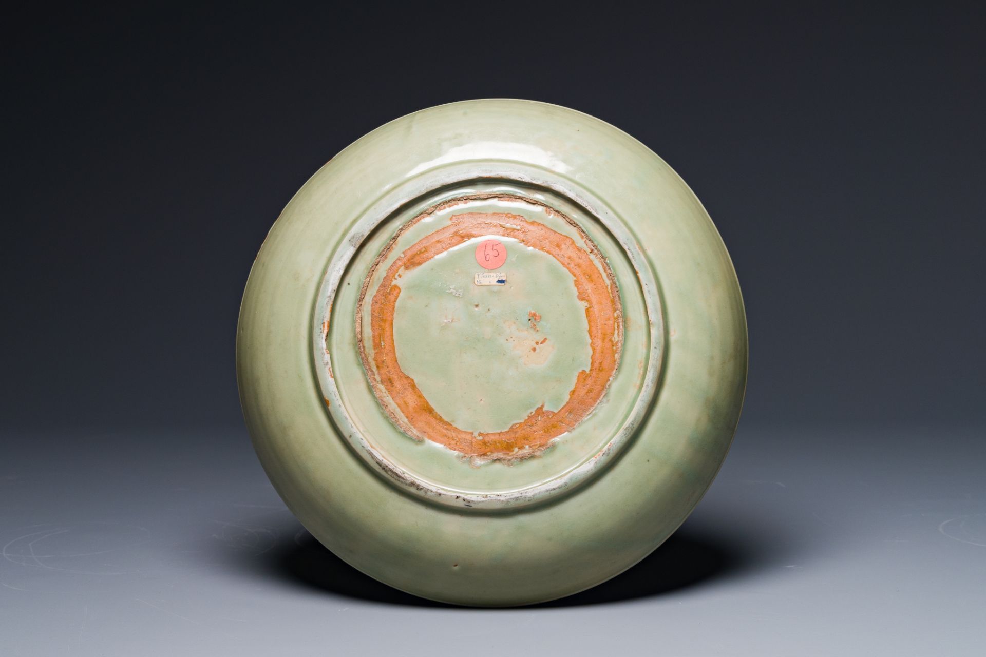 A Chinese Longquan celadon dish with anhua floral design, Ming - Image 2 of 2