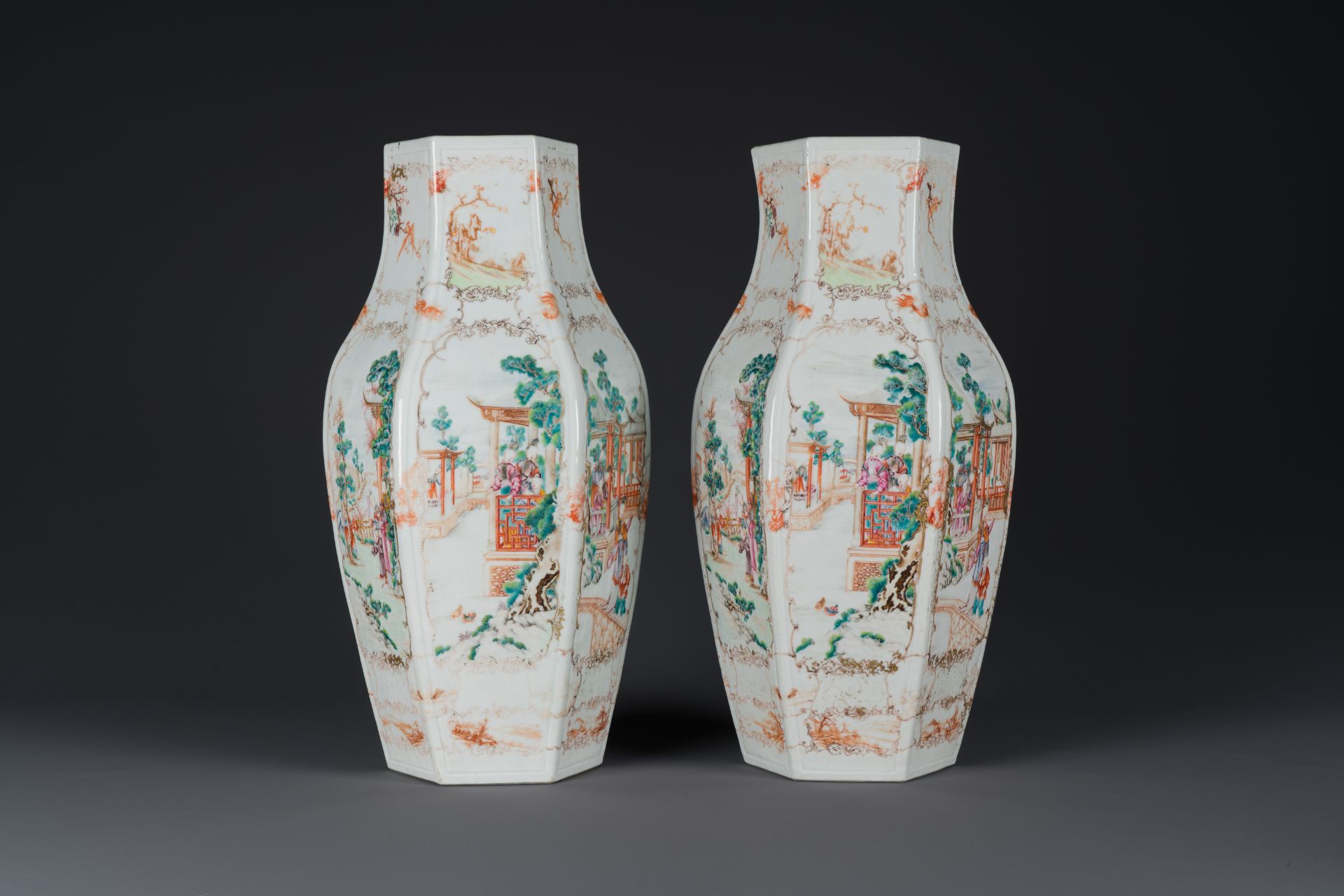 A pair of Chinese hexagonal Canton famille rose 'mandarin subject' vases, Qianlong - Image 3 of 6
