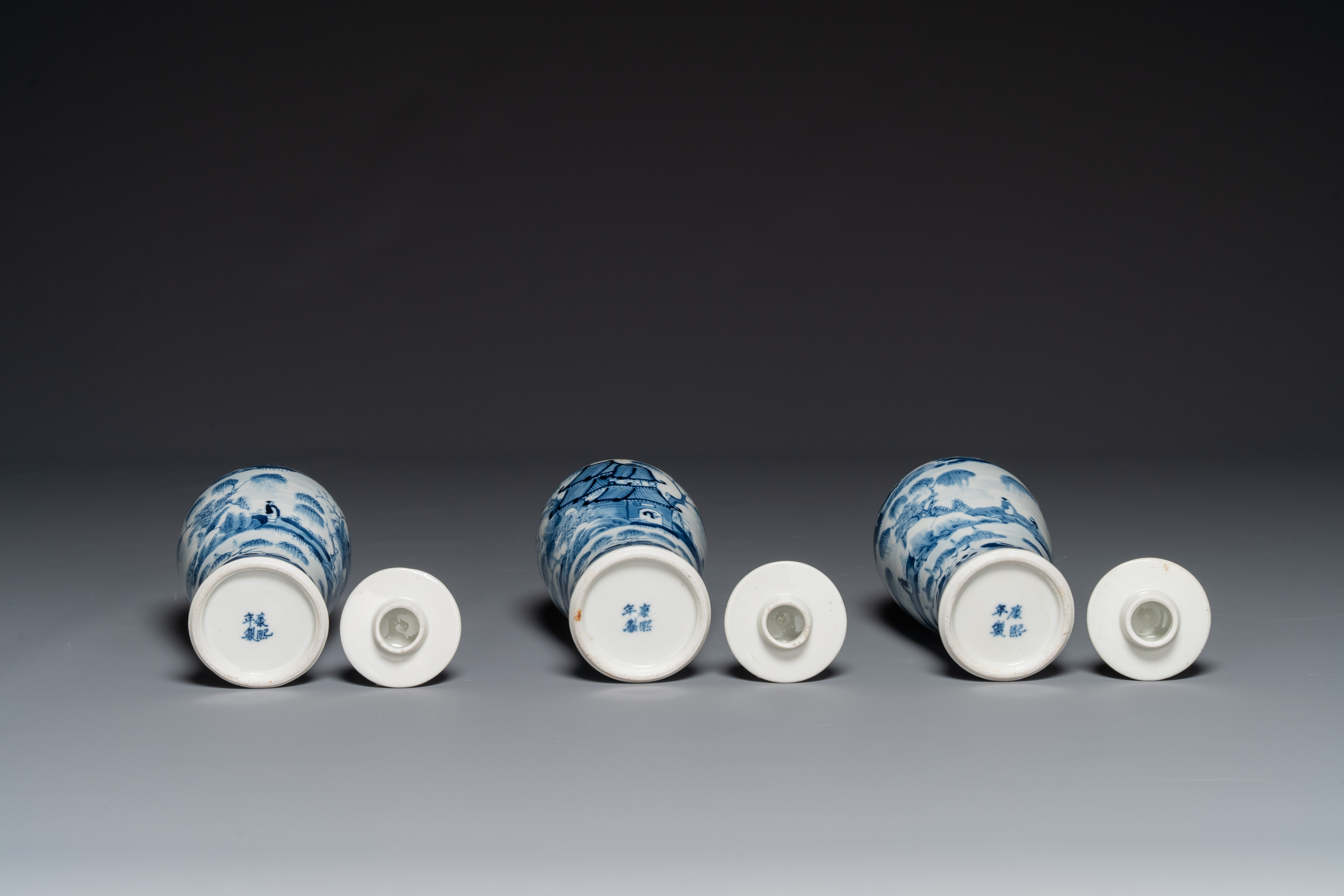 A Chinese blue and white garniture of five vases with landscape design, 19th C. - Image 4 of 6
