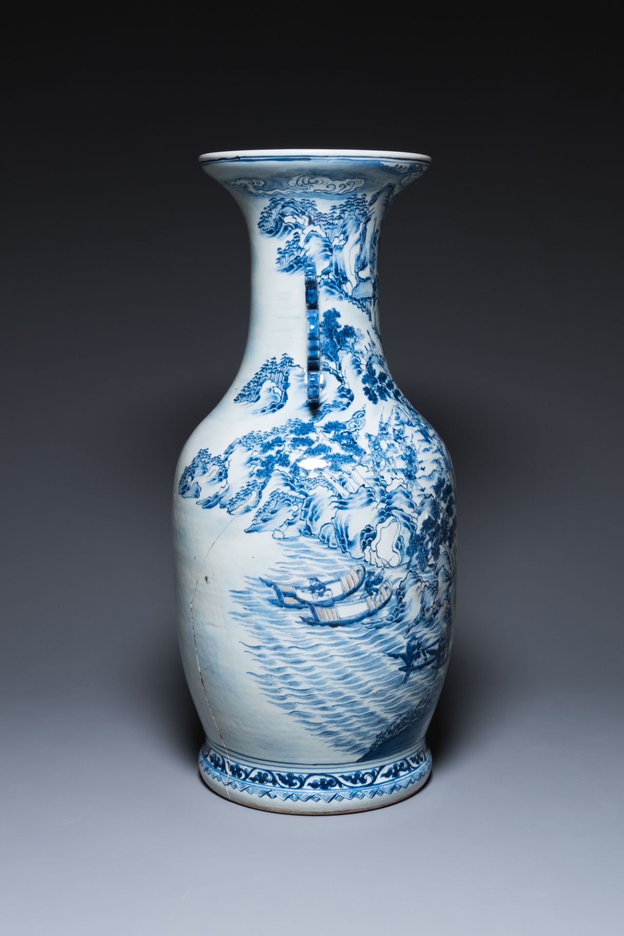 A large Chinese blue, white and copper-red vase with a mountainous river landscape, 19th C. - Image 2 of 6