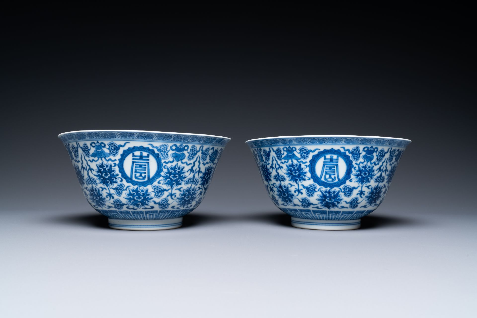 A pair of Chinese blue and white 'wan shou wu jiang' bowls, Qianlong mark and of the period - Image 5 of 40