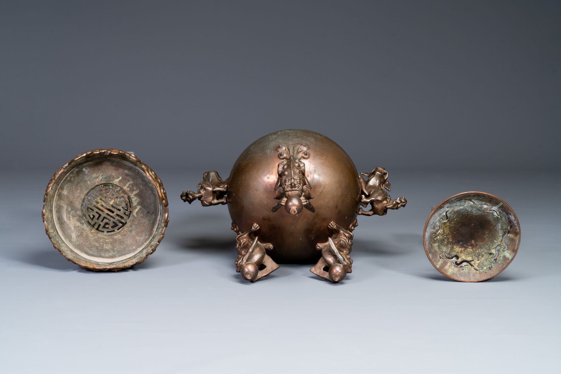 A large Chinese bronze censer and cover on stand decorated with six lions, 19th C. - Image 6 of 6