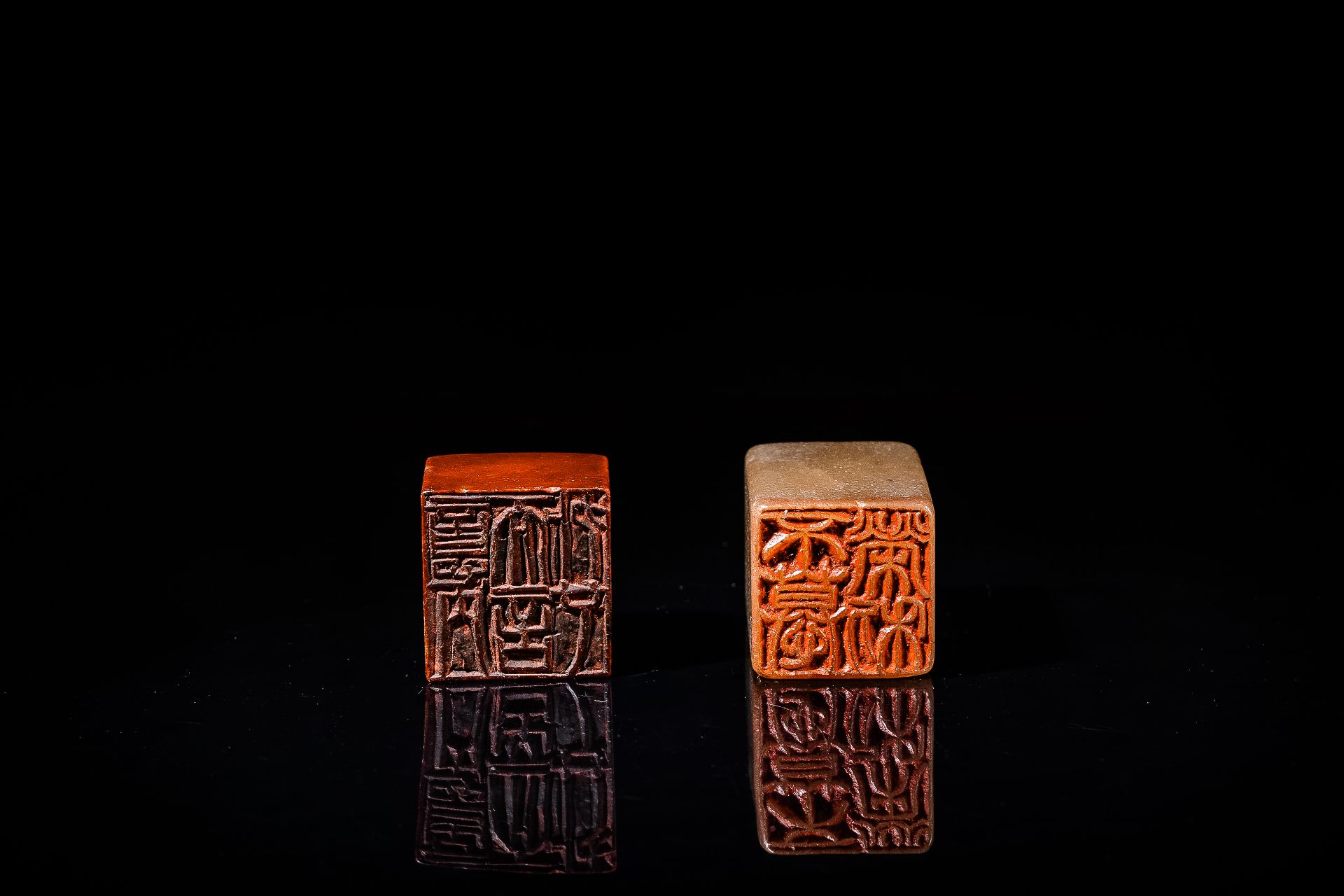 A Chinese 'chicken blood' soapstone seal and a russet jade seal, Qing - Image 6 of 6