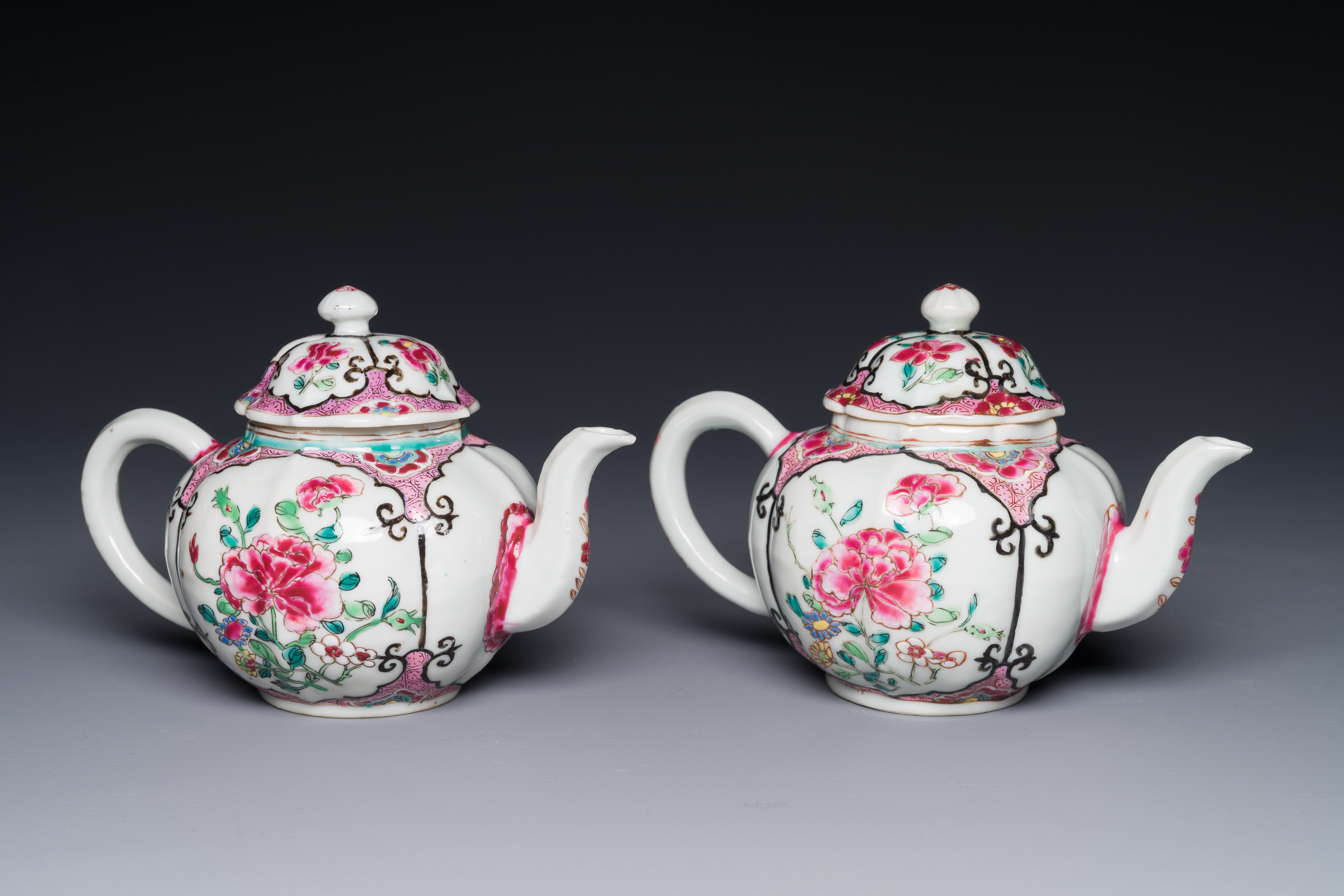 A pair of Chinese famille rose teapots with floral decor, Qianlong